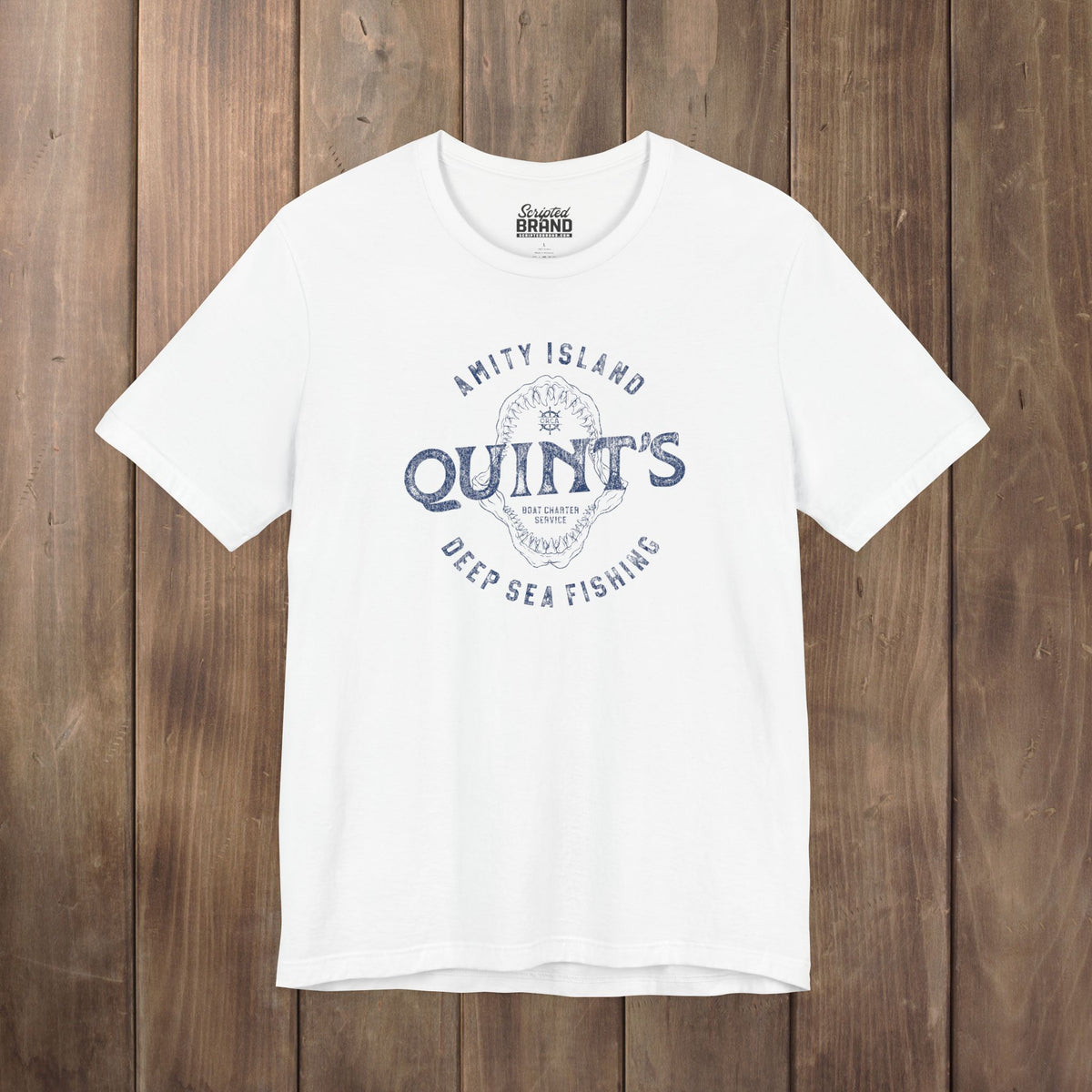 White t-shirt featuring the Quint's Deep Sea Fishing Boat Charters logo graphic inspired by the movie Jaws in a vintage distressed style.