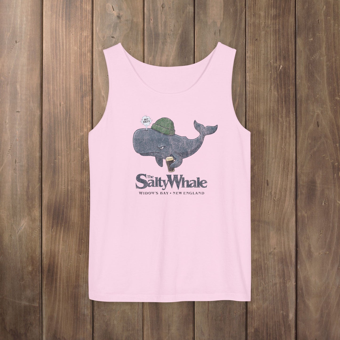 Pink Comfort Colors tank with the Salty Whale logo from Widow's Bay, a beanie-wearing cartoon whale drinking dark beer