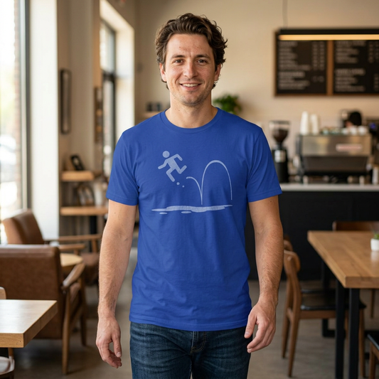 Person wearing Royal blue tee with vintage distressed Portal 2 Repulsion Gel icon of a figure bouncing off gel