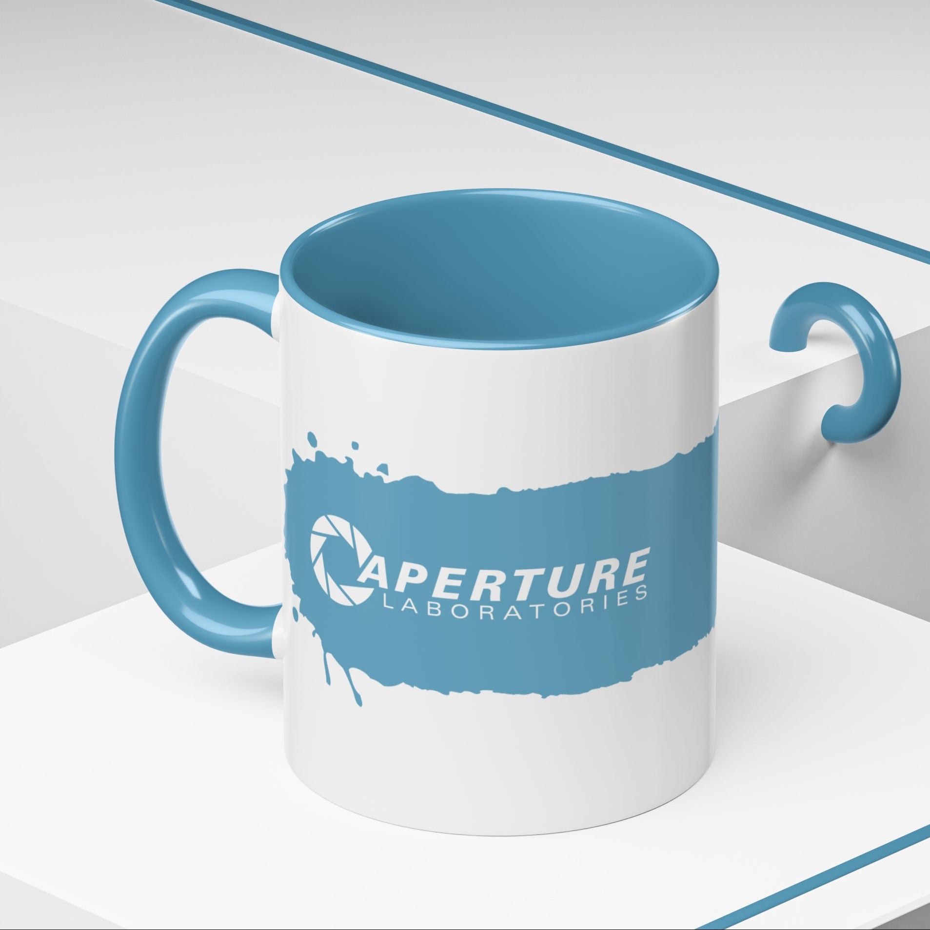 Angled view of 11oz Portal 2 Aperture Laboratories blue Repulsion Gel accent mug with blue handle, glossy ceramic.