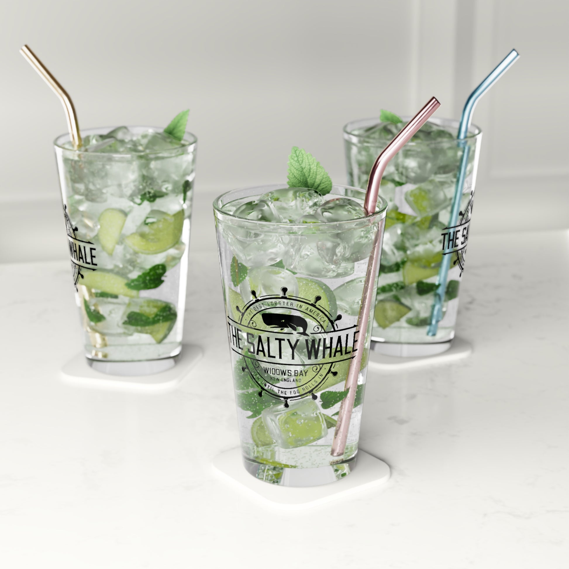 Three Clear 16 oz pint glass with the vintage black Salty Whale maritime crest logo from Widow's Bay, New England
