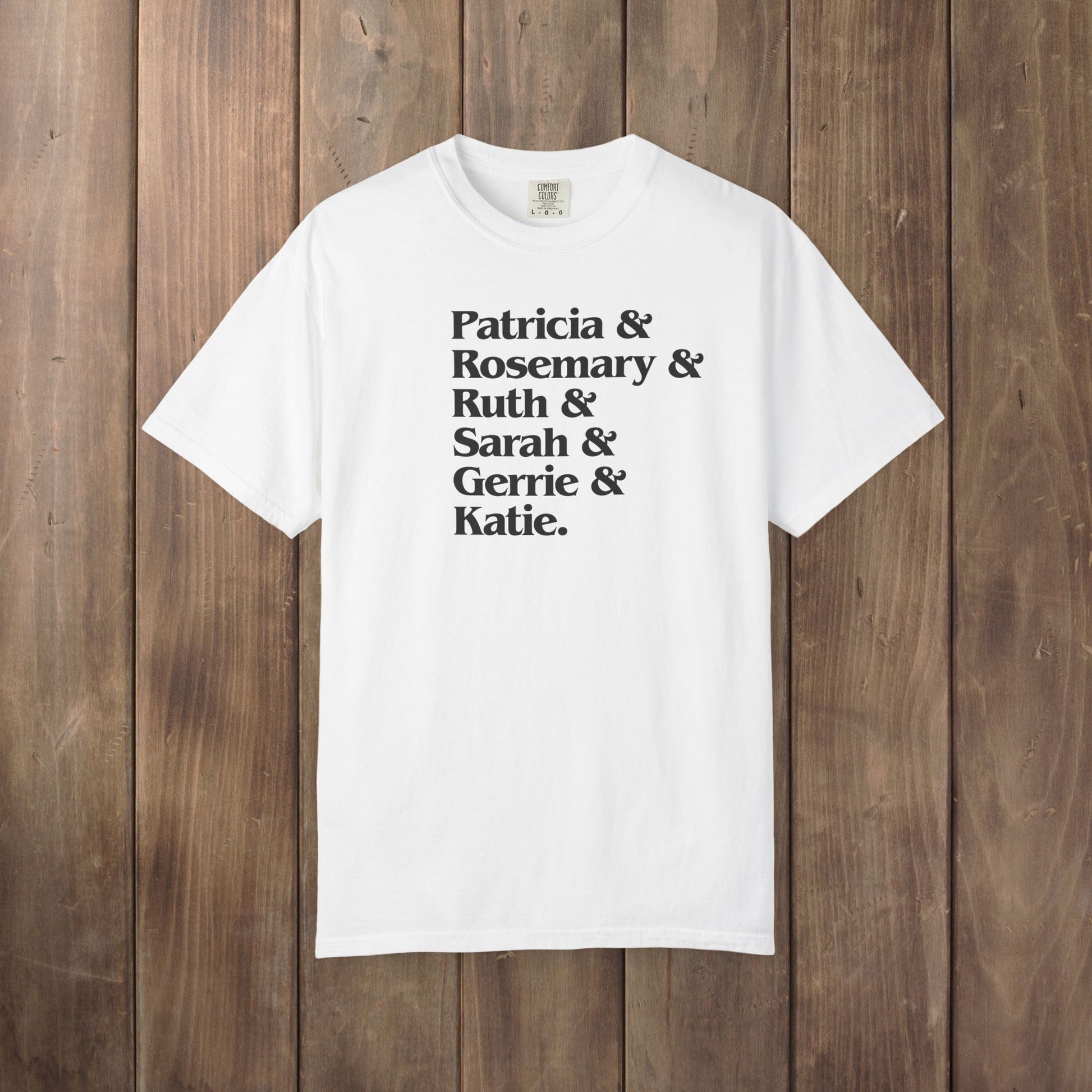 White Comfort Colors tee listing the women of Widow's Bay: Patricia, Rosemary, Ruth, Sarah, Gerrie, and Katie