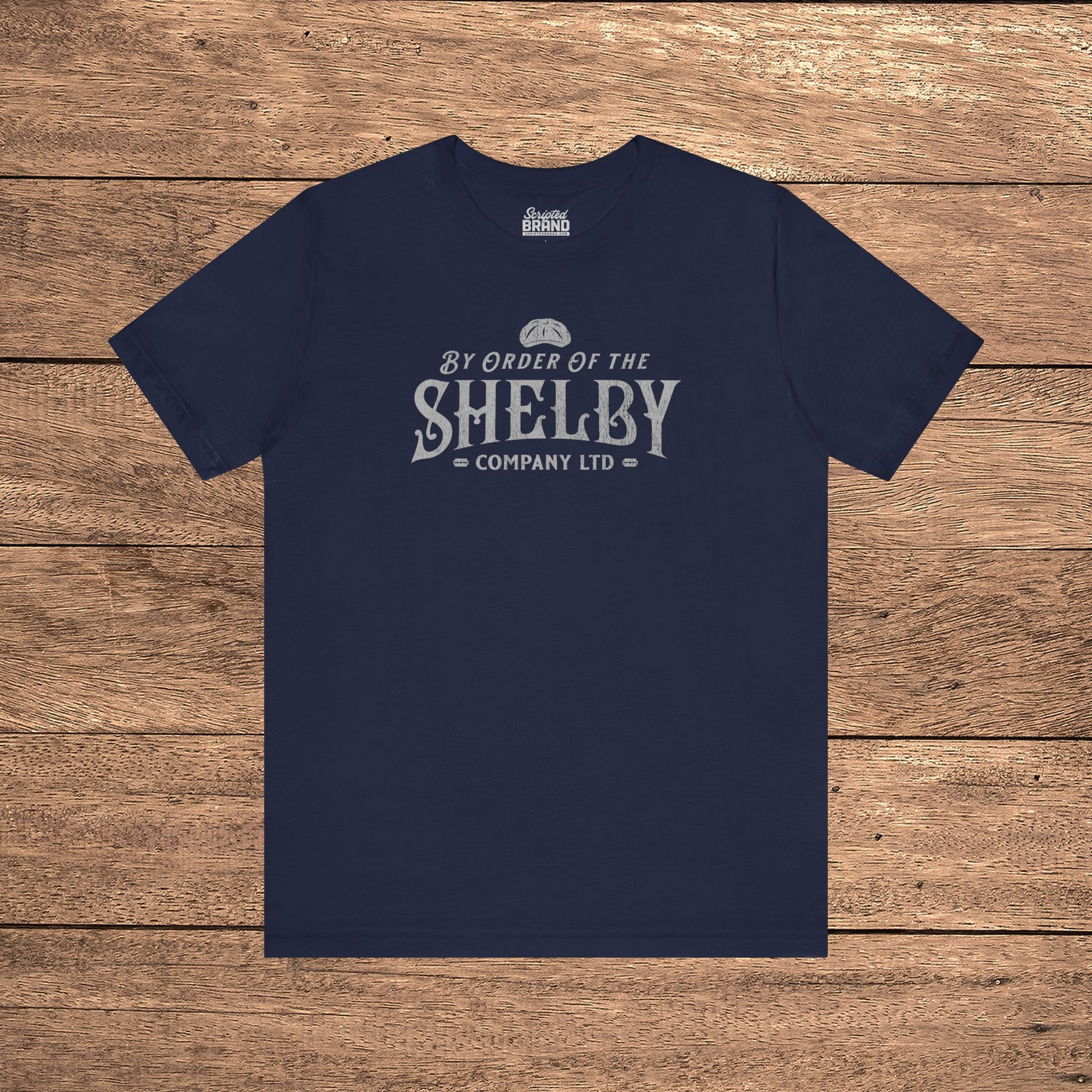 Navy blue Bella+Canvas 3001 t-shirt featuring a Shelby Company Limited logo graphic from Peaky Blinders.