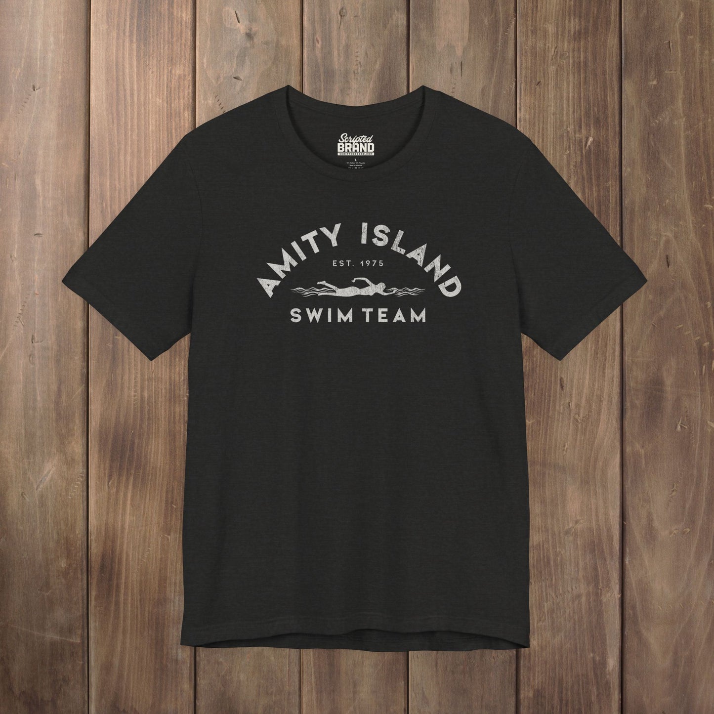 Heather black tee with vintage distressed Amity Island Swim Team Jaws-inspired swimmer logo
