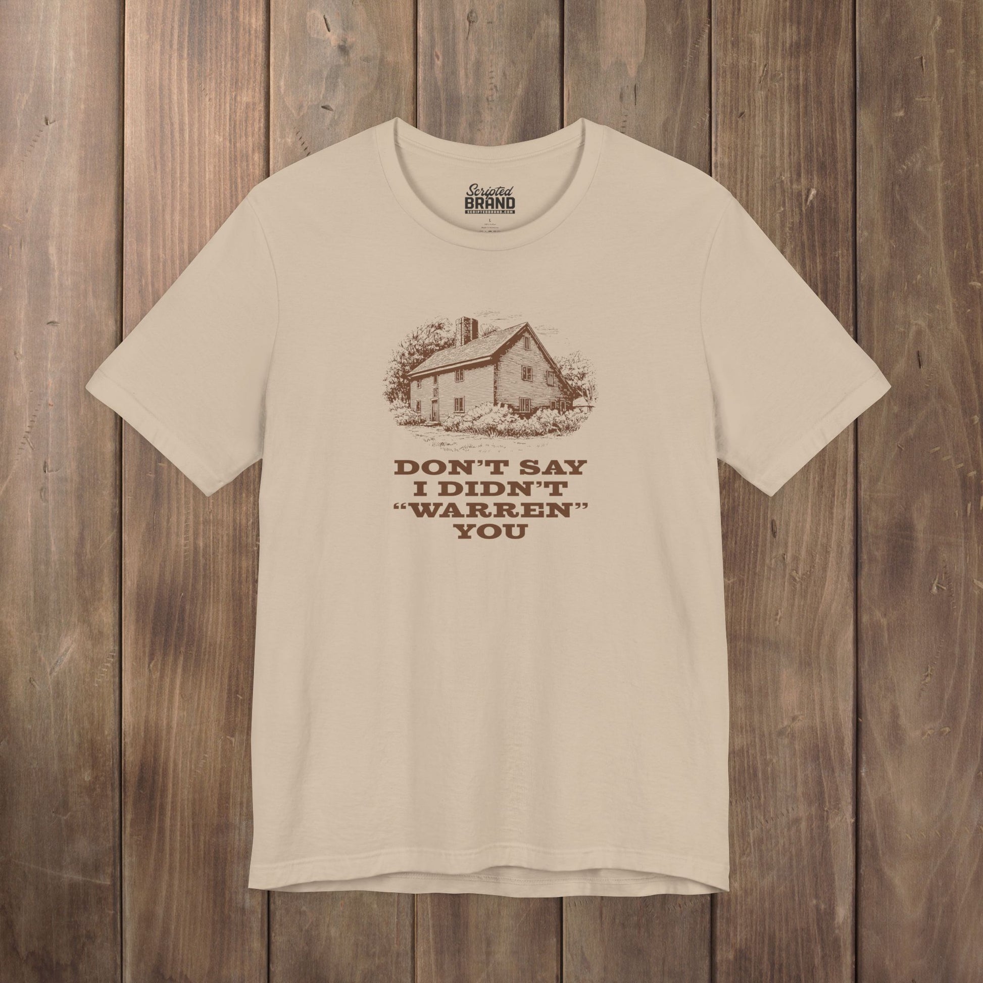 Tan Bella+Canvas tee with vintage Warren house illustration and the pun "Don't Say I Didn't Warren You" from Widow's Bay show