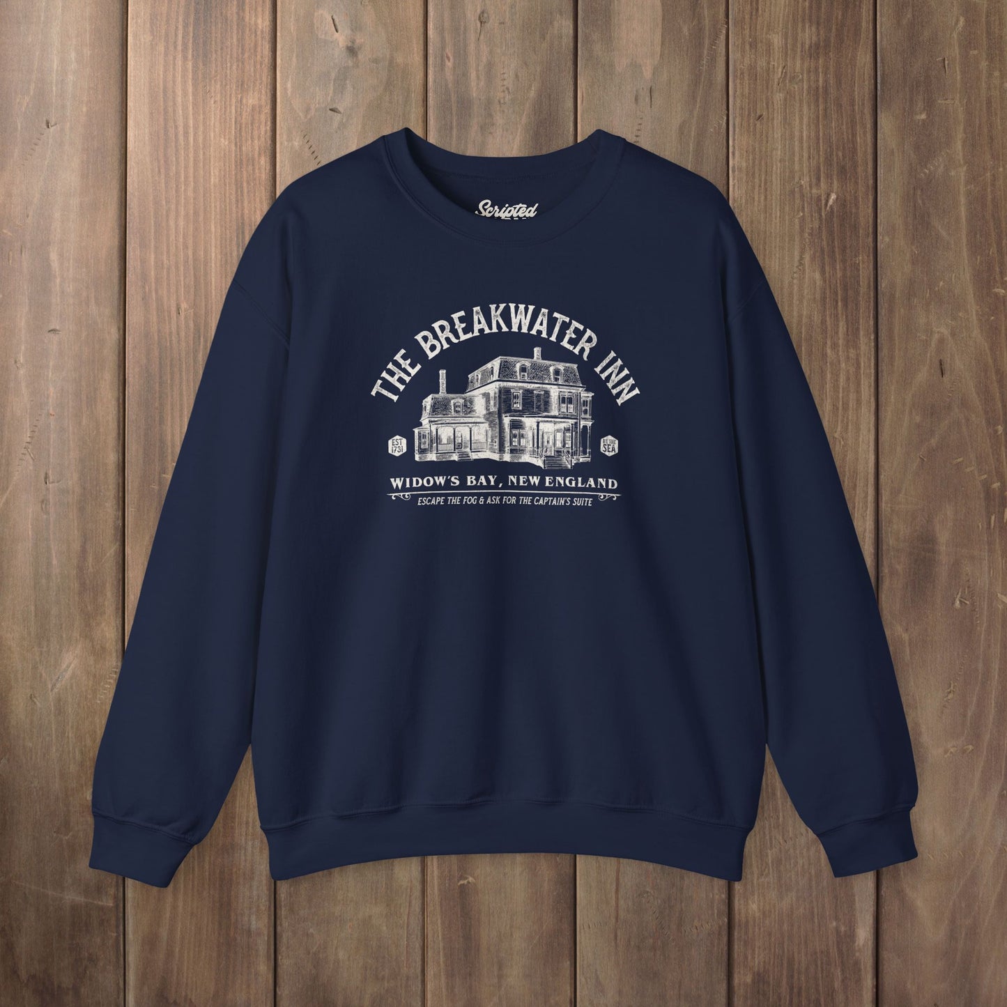 Navy blue crewneck sweatshirt with Breakwater Inn Widow's Bay New England hotel graphic