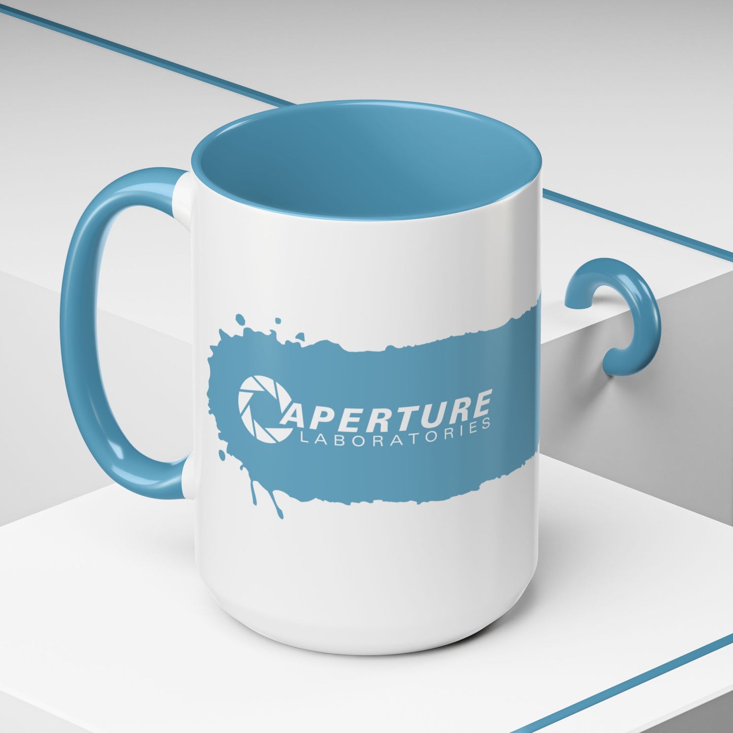 Angled view of 15oz Portal 2 Aperture Laboratories blue Repulsion Gel accent mug with blue handle, glossy ceramic.