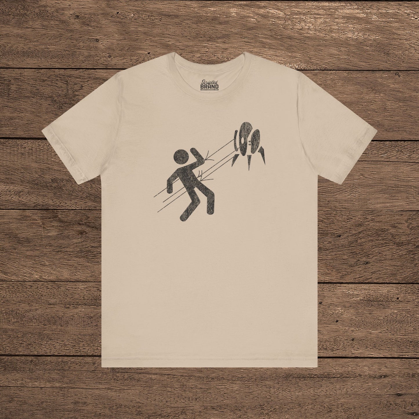 Tan Aperture Science Turret warning icon t-shirt on Bella+Canvas 3001, vintage distressed print, Portal and Portal 2 fan tee.
