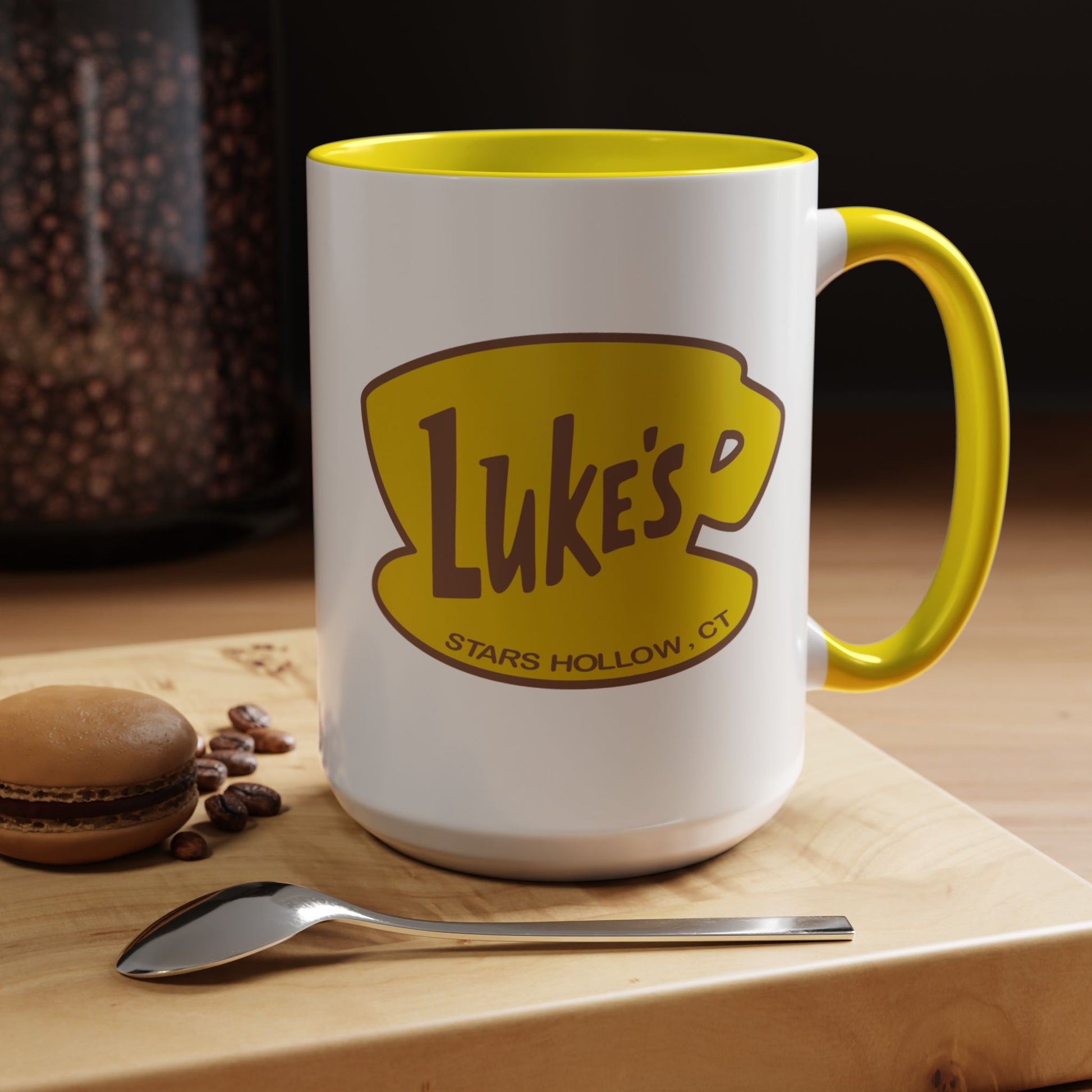 Kitchen view of 15 oz White ceramic mug with yellow handle and Luke’s Diner logo from Gilmore Girls printed on both sides.