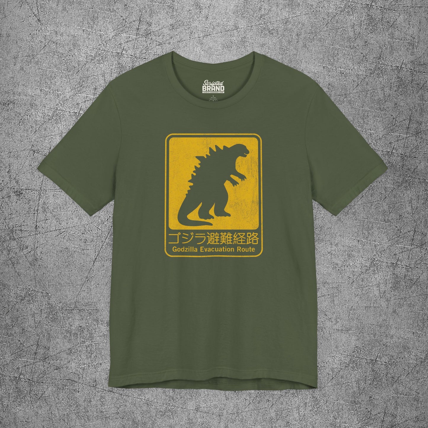 Military green Godzilla Evacuation Route distressed graphic t-shirt inspired by Monarch Legacy of Monsters, soft Bella+Canvas tee