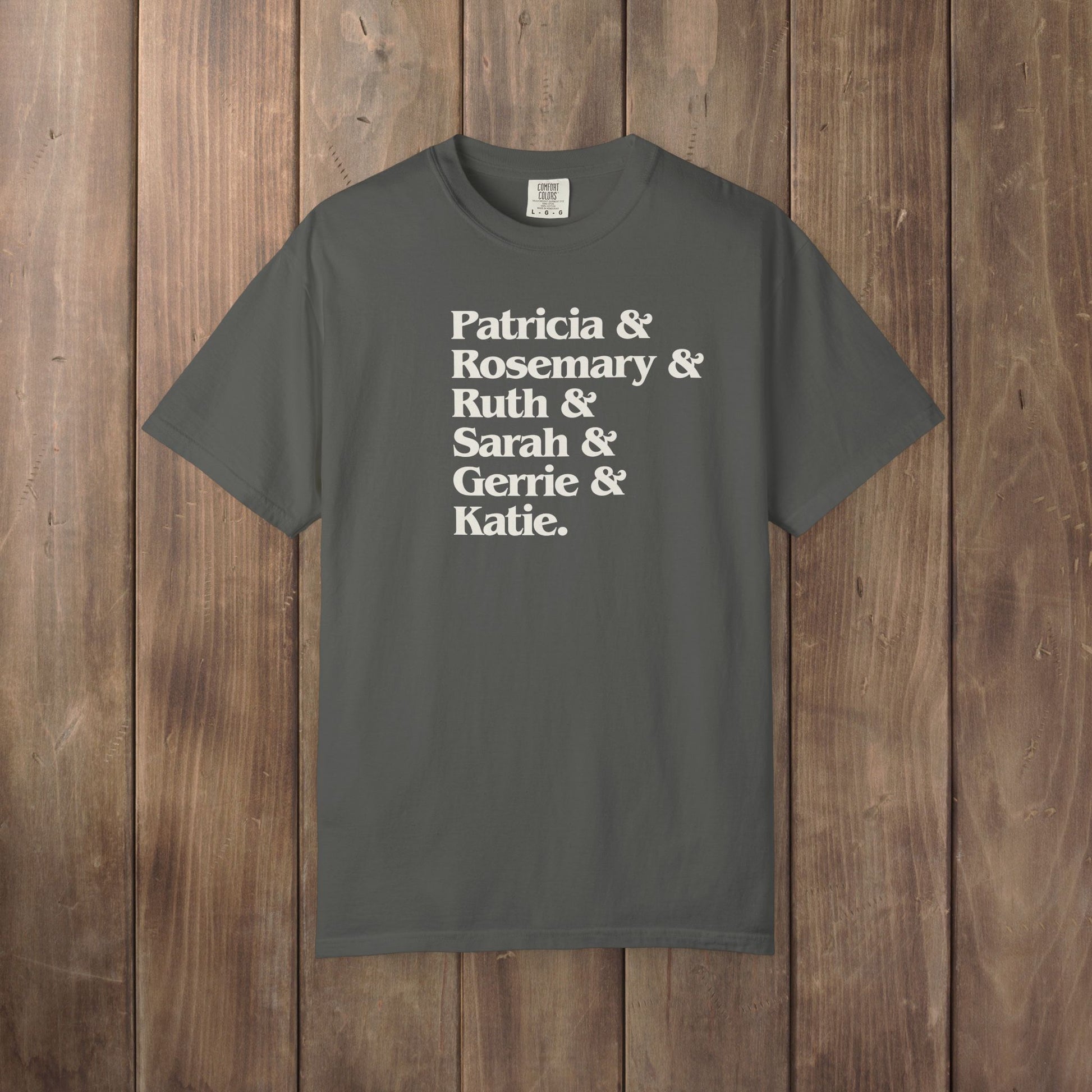 Pepper gray Comfort Colors tee listing the women of Widow's Bay: Patricia, Rosemary, Ruth, Sarah, Gerrie, and Katie