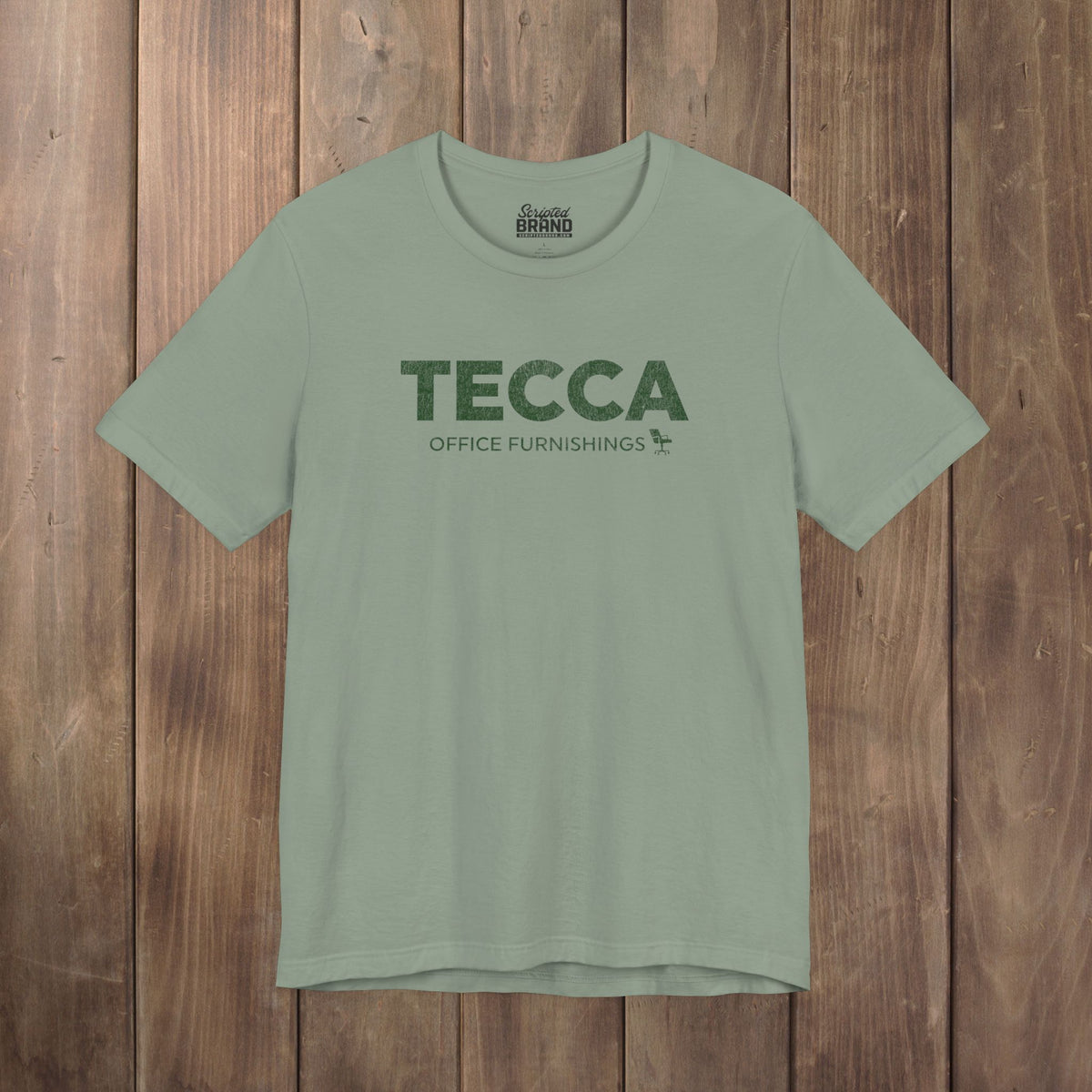 Sage green TECCA Office Furnishings tee inspired by The Chair Company. Bella+Canvas tim robinson shirt comedy.