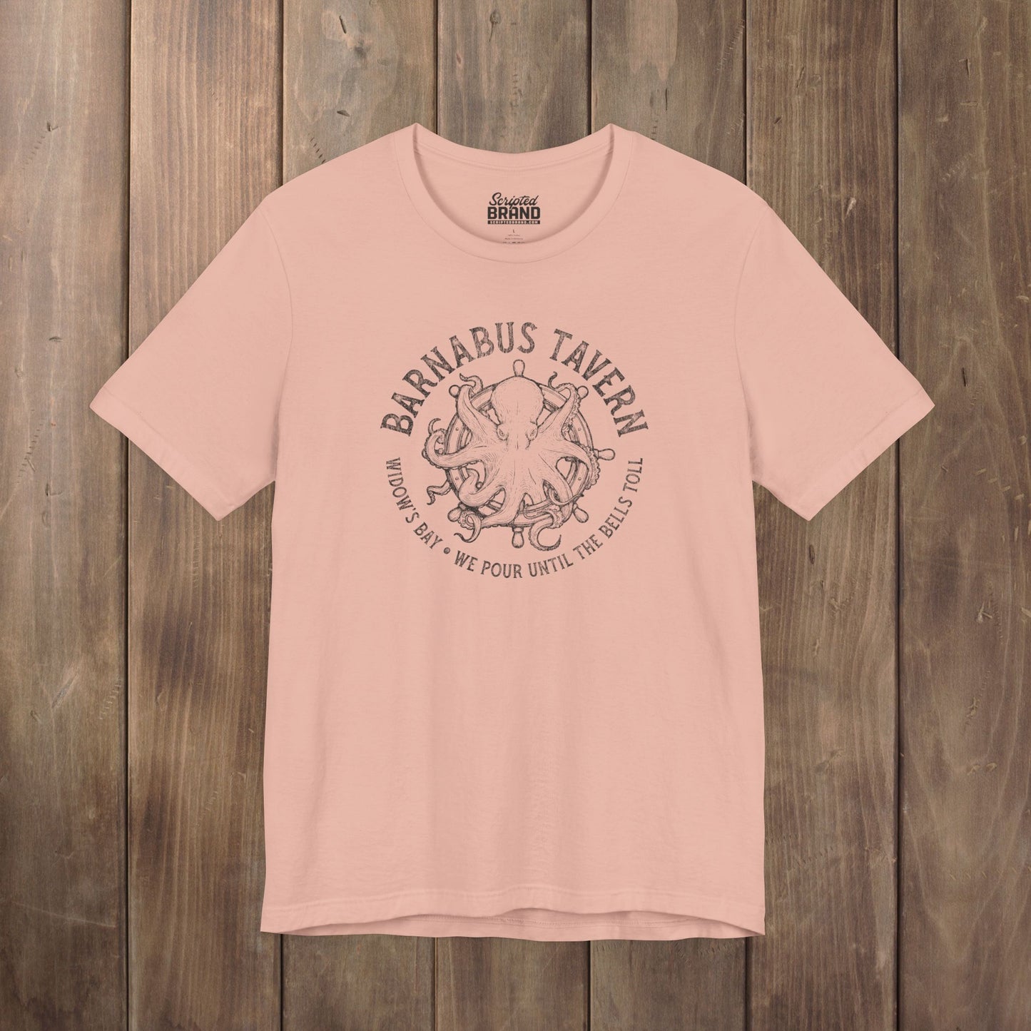 Peach tee with vintage engraved Barnabus Tavern octopus and ship's wheel Widow's Bay design