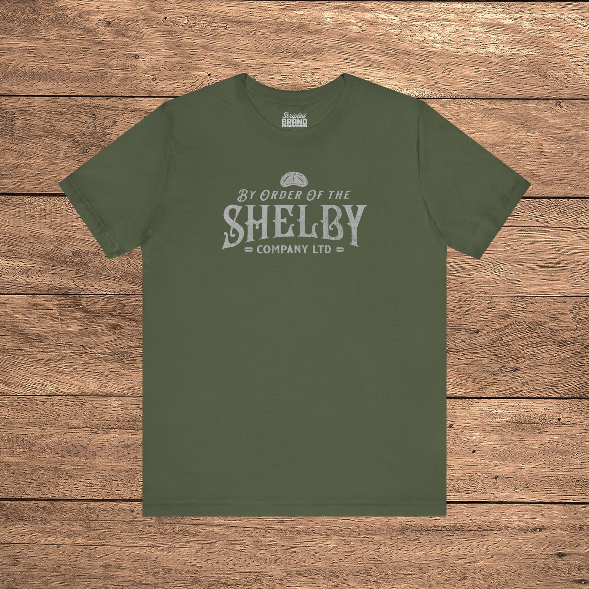 Military green Bella+Canvas 3001 t-shirt featuring a Shelby Company Limited logo graphic from Peaky Blinders.