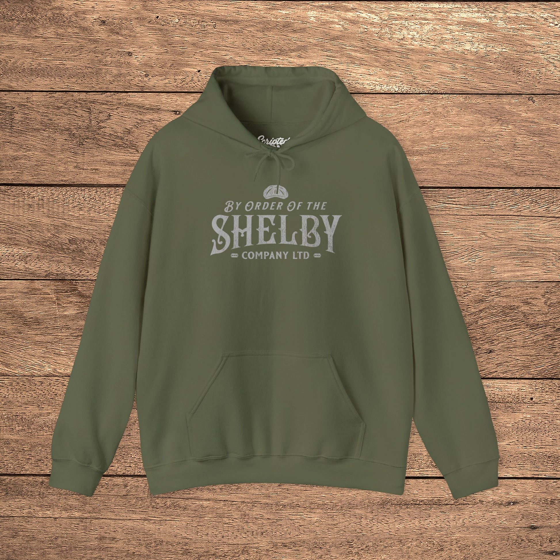 Military Green Unisex Gildan 18500 Heavy Blend Hoodie Sweatshirt with a vintage Shelby Company Limited logo graphic from Peaky Blinders.