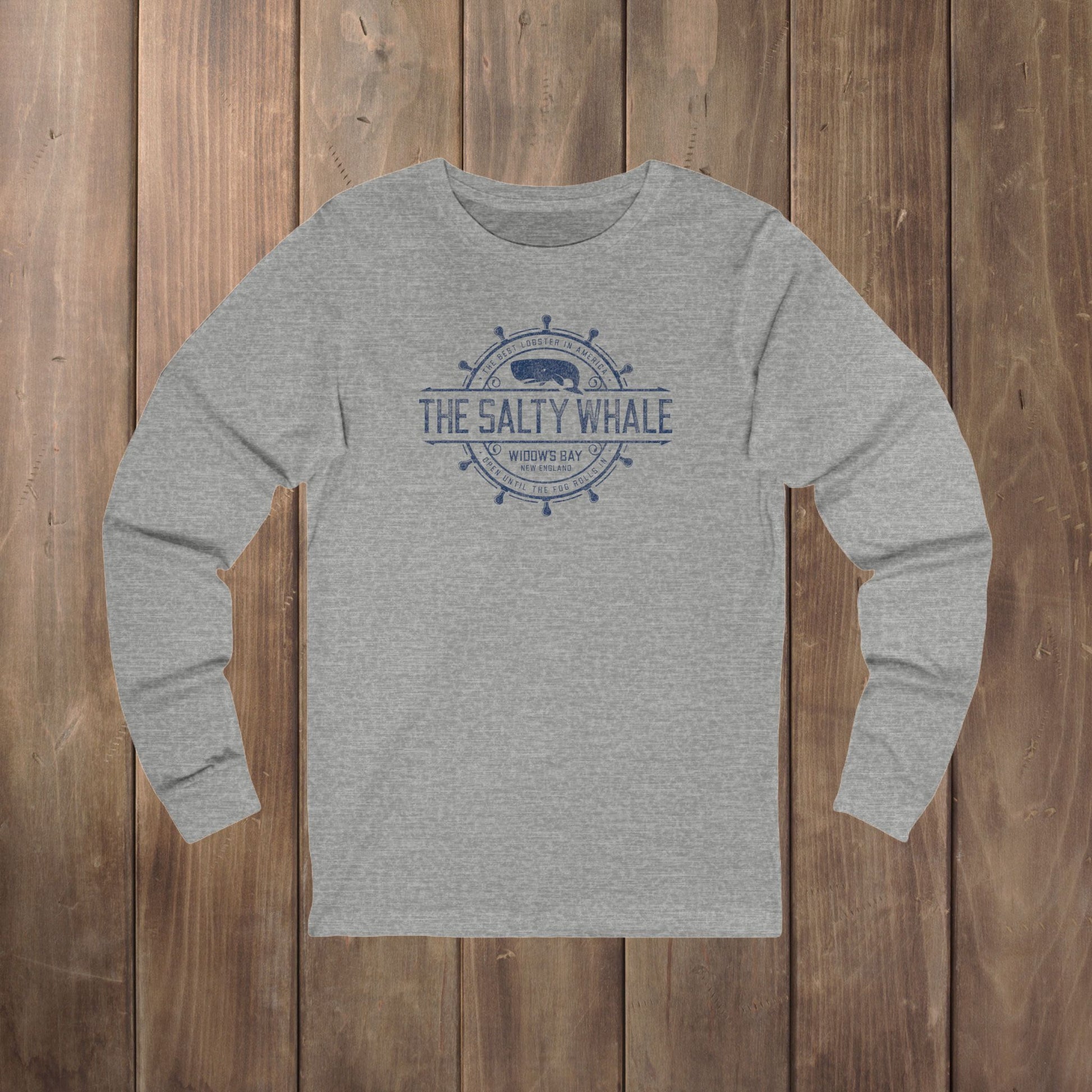 Heather gray long-sleeve tee with the gold distressed Salty Whale maritime crest logo from Widow's Bay, New England