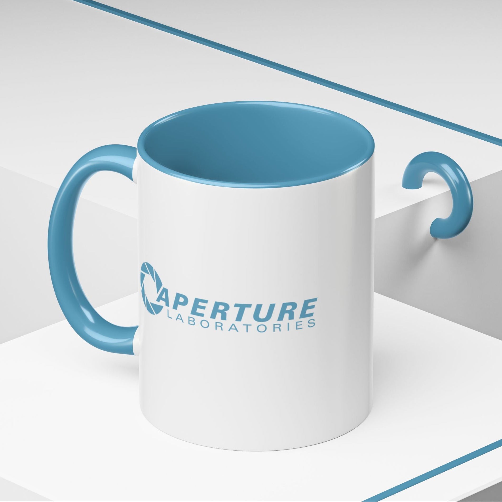 Mug with blue interior and handle featuring 'Aperture Laboratories' logo on a white background.