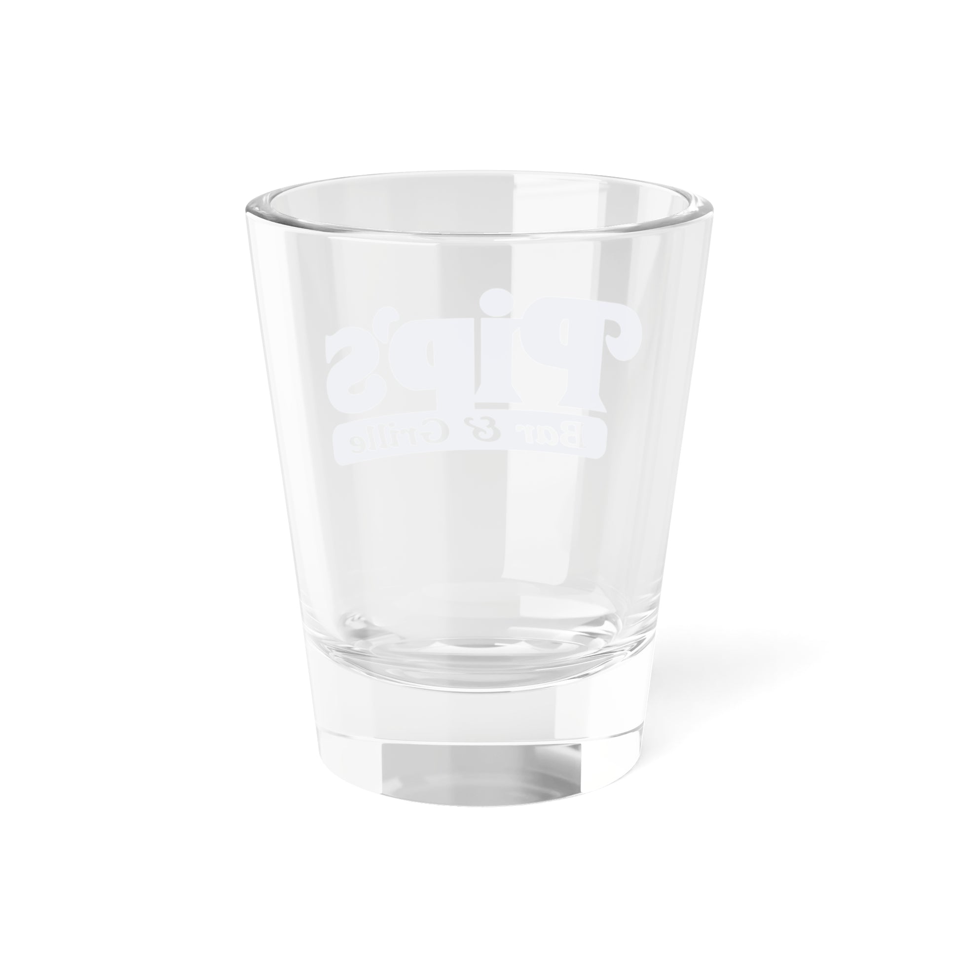 Back side of a 1.5 oz ounce clear shot glass featuring the Pips Bar and Grill logo from the Apple TV show Severance printed on one side.