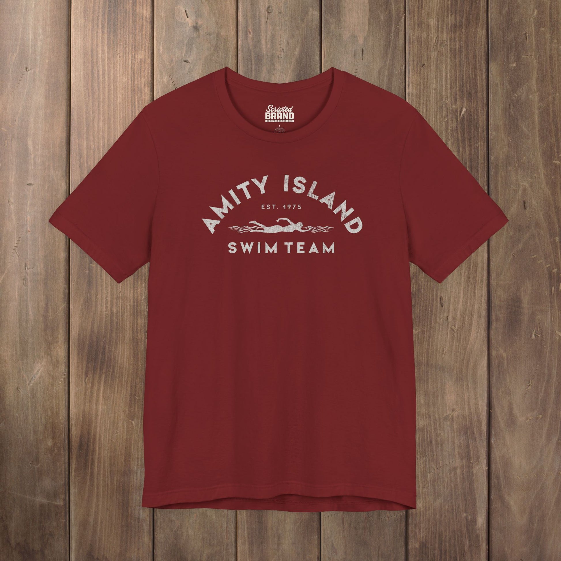 Heather lifeguard red tee with vintage distressed Amity Island Swim Team Jaws-inspired swimmer logo