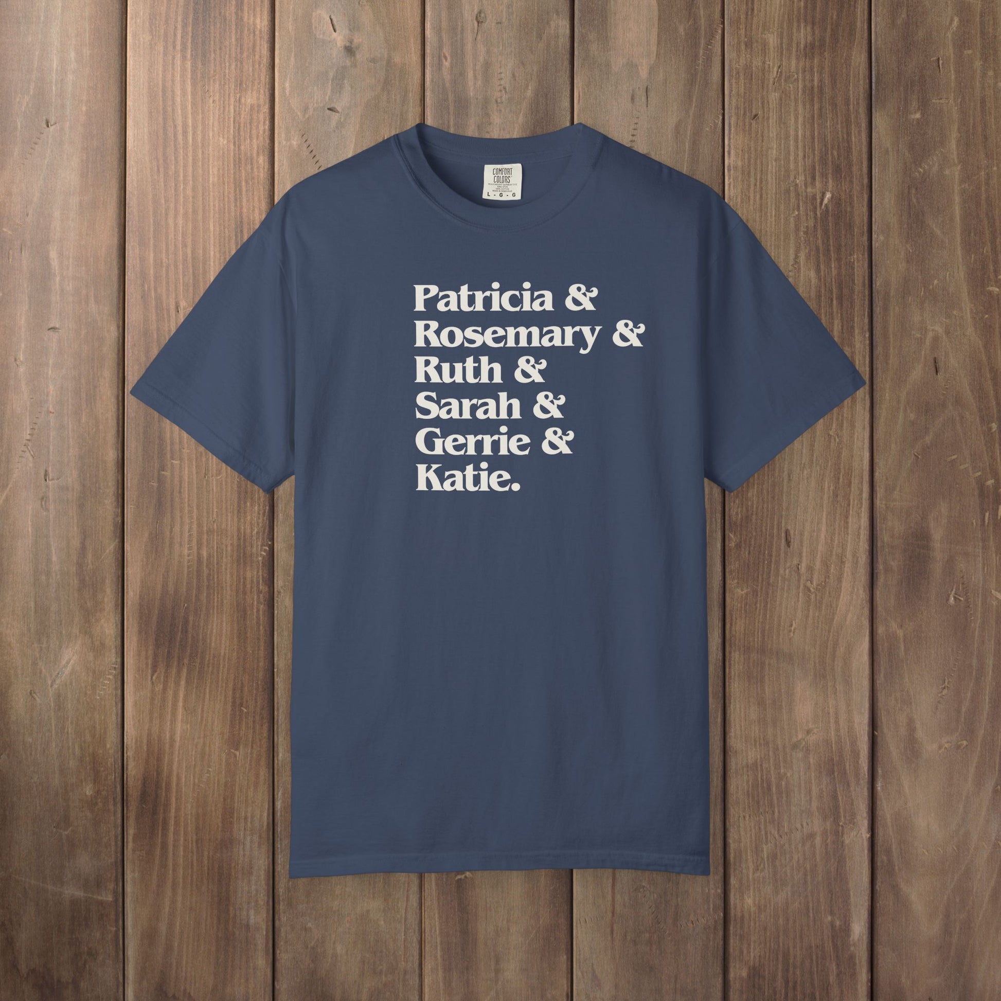 Midnight blue Comfort Colors tee listing the women of Widow's Bay: Patricia, Rosemary, Ruth, Sarah, Gerrie, and Katie