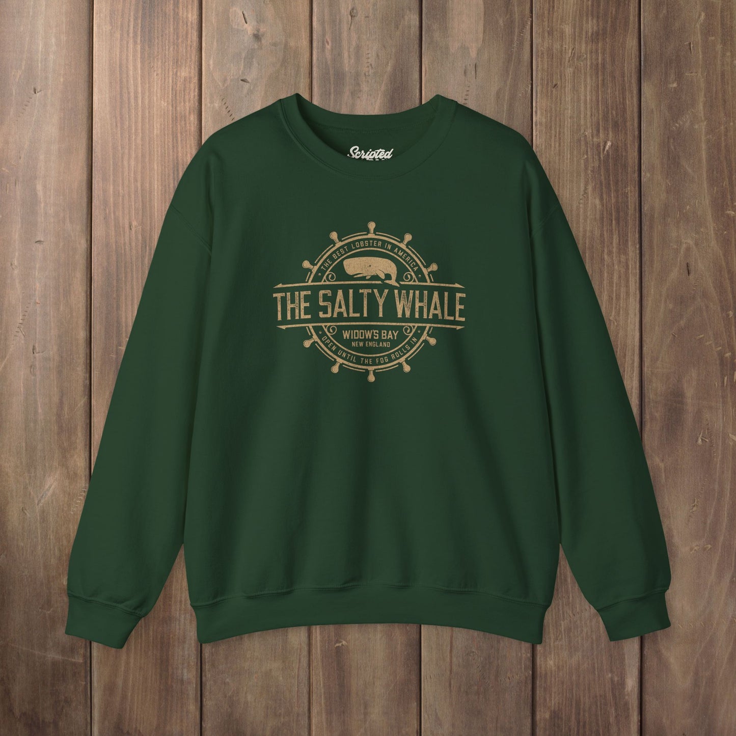 Forest green Gildan crewneck sweatshirt with the distressed Salty Whale maritime crest logo from TV show Widow's Bay