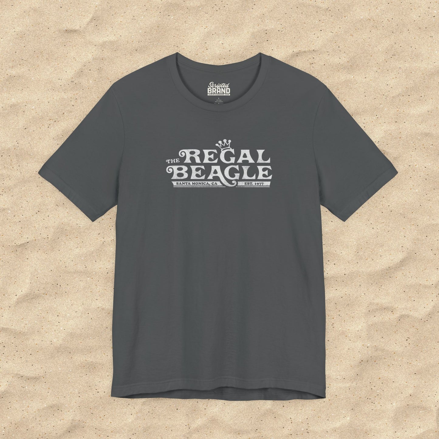 Asphalt dark gray Bella+Canvas t-shirt with the Regal Beagle logo from the TV Show 'Threes Company' in a vintage distressed style.