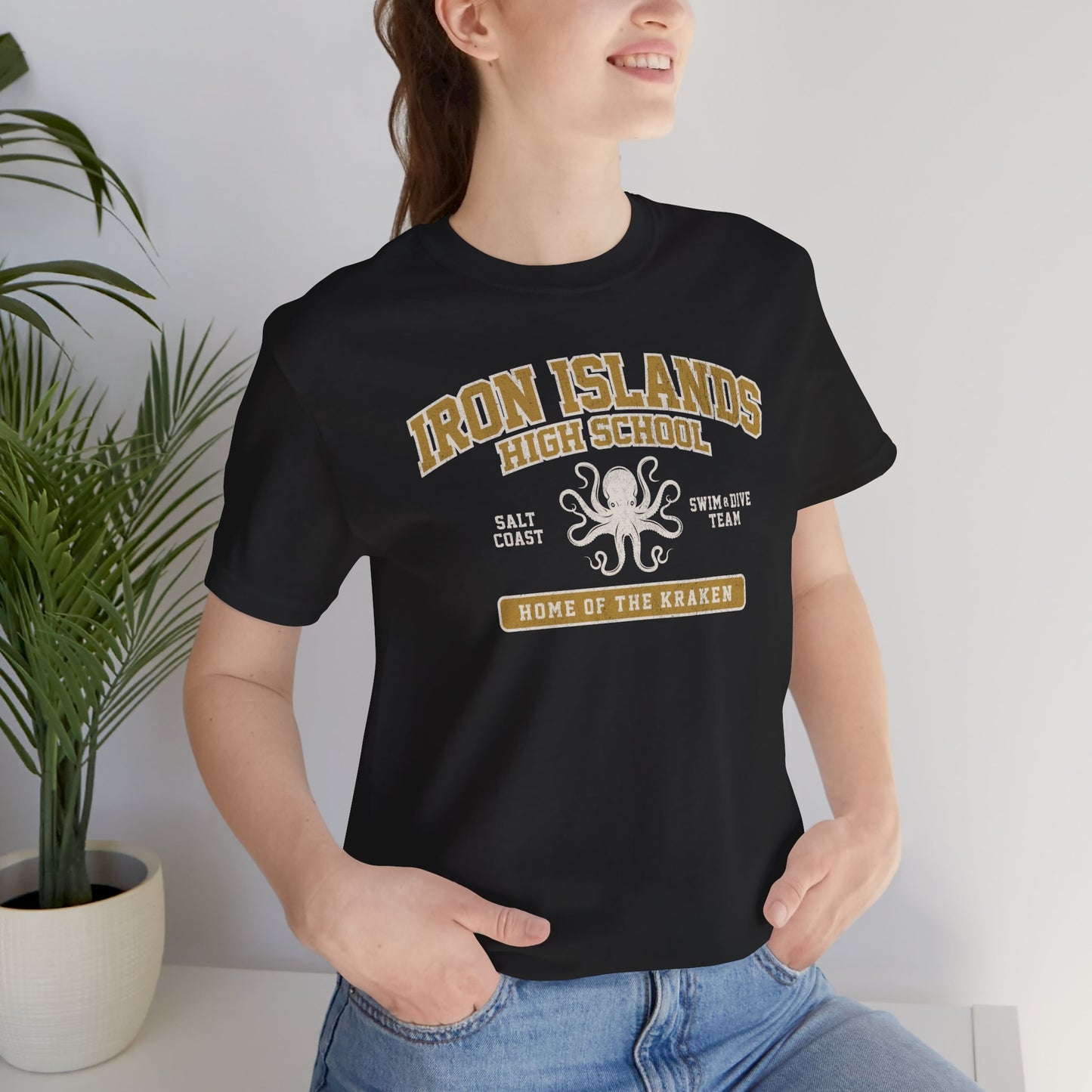 Woman wearing black Iron Islands High School t-shirt with vintage lion graphic inspired by Game of Thrones.