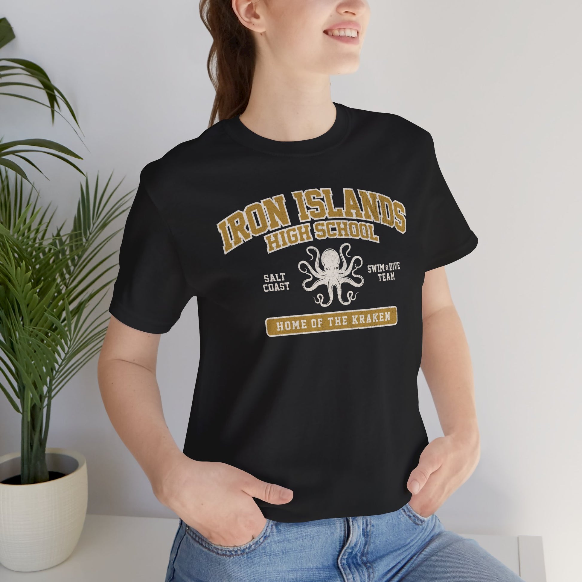 Woman wearing black Iron Islands High School t-shirt with vintage lion graphic inspired by Game of Thrones.