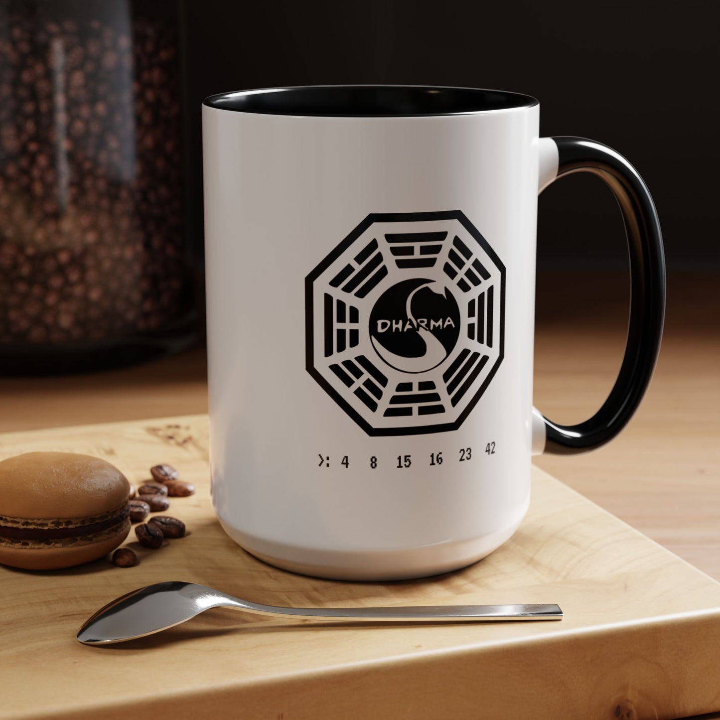 15 oz White ceramic Dharma Initiative Swan Station logo mug with black handle and interior, hatch numbers 4 8 15 16 23 42, shown in kitchen