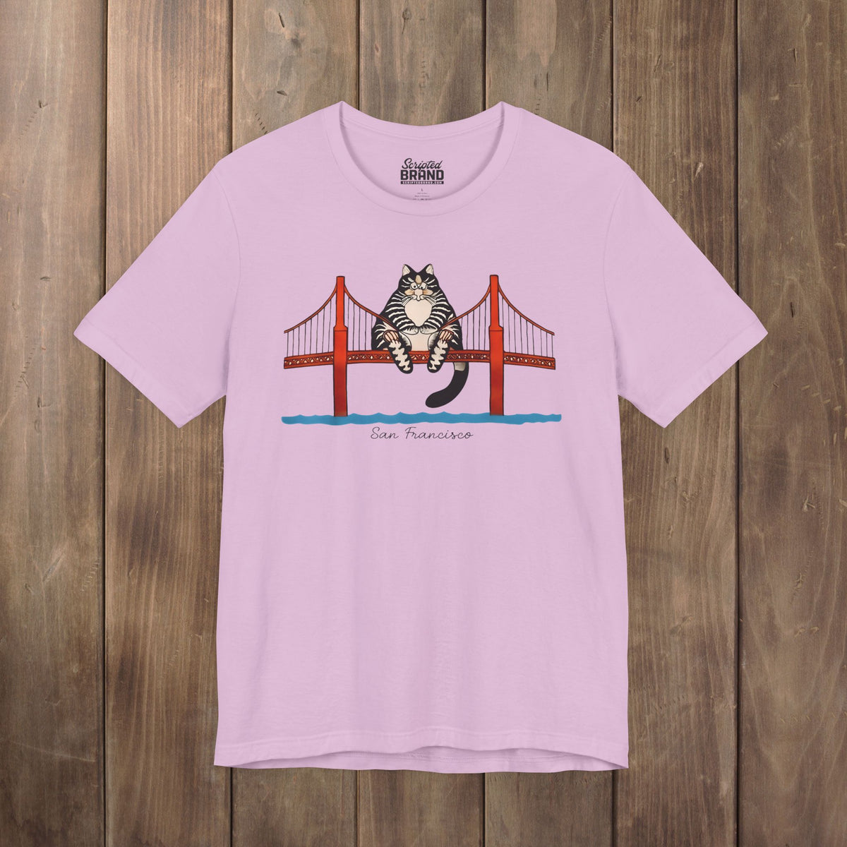 Lilac purple tee with illustrated tabby cat sitting on the Golden Gate Bridge, San Francisco, Project Hail Mary