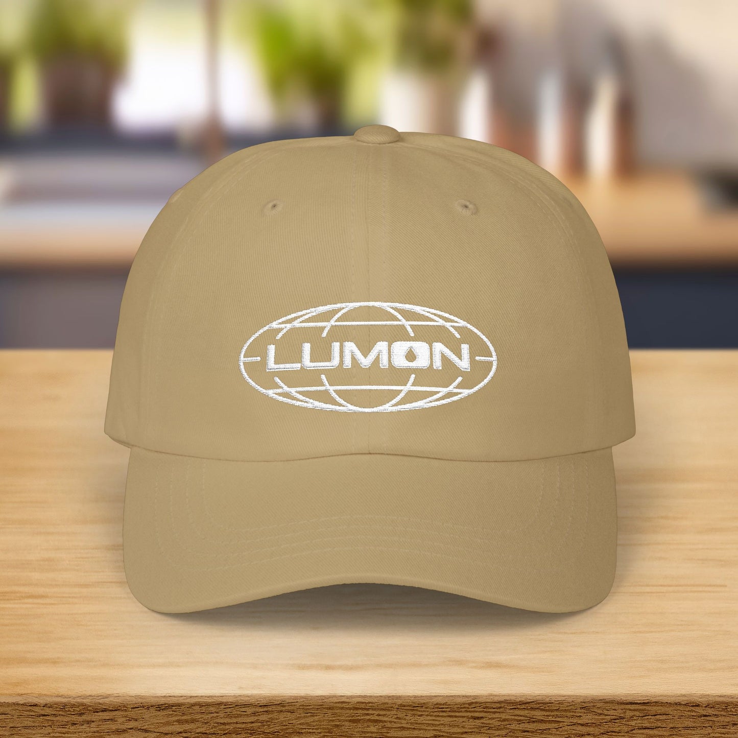 Khaki dad hat with white embroidered Lumon Industries globe logo, Severance-inspired design cap