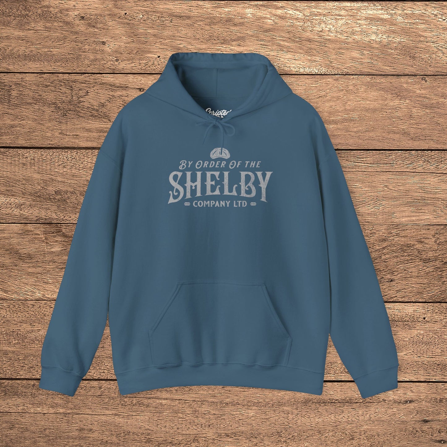 Indigo blue Unisex Gildan 18500 Heavy Blend Hoodie Sweatshirt with a vintage Shelby Company Limited logo graphic from Peaky Blinders.