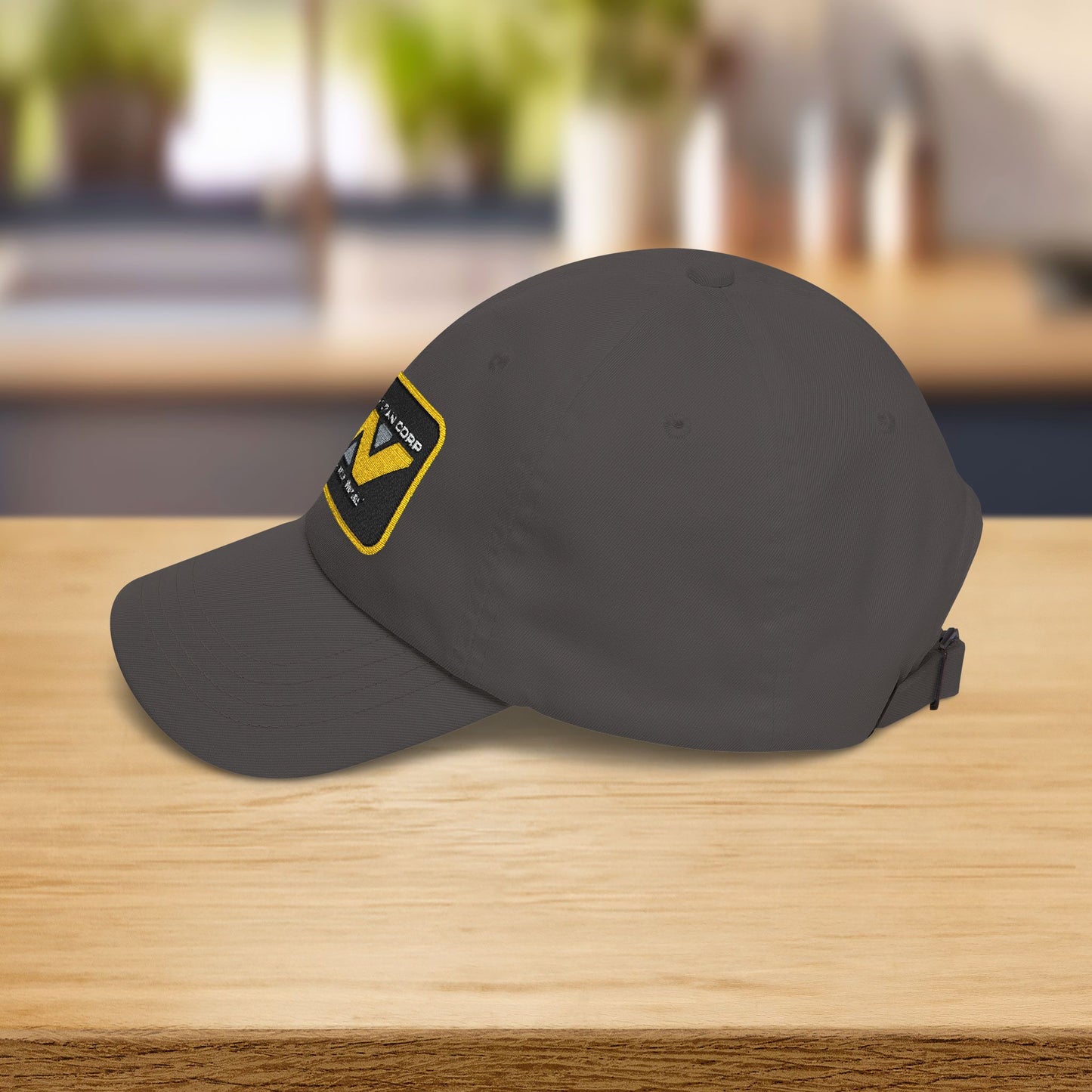 Left Side view of Yupoong dad cap with embroidered Weyland-Yutani Corp patch logo from the Alien franchise in yellow and silver