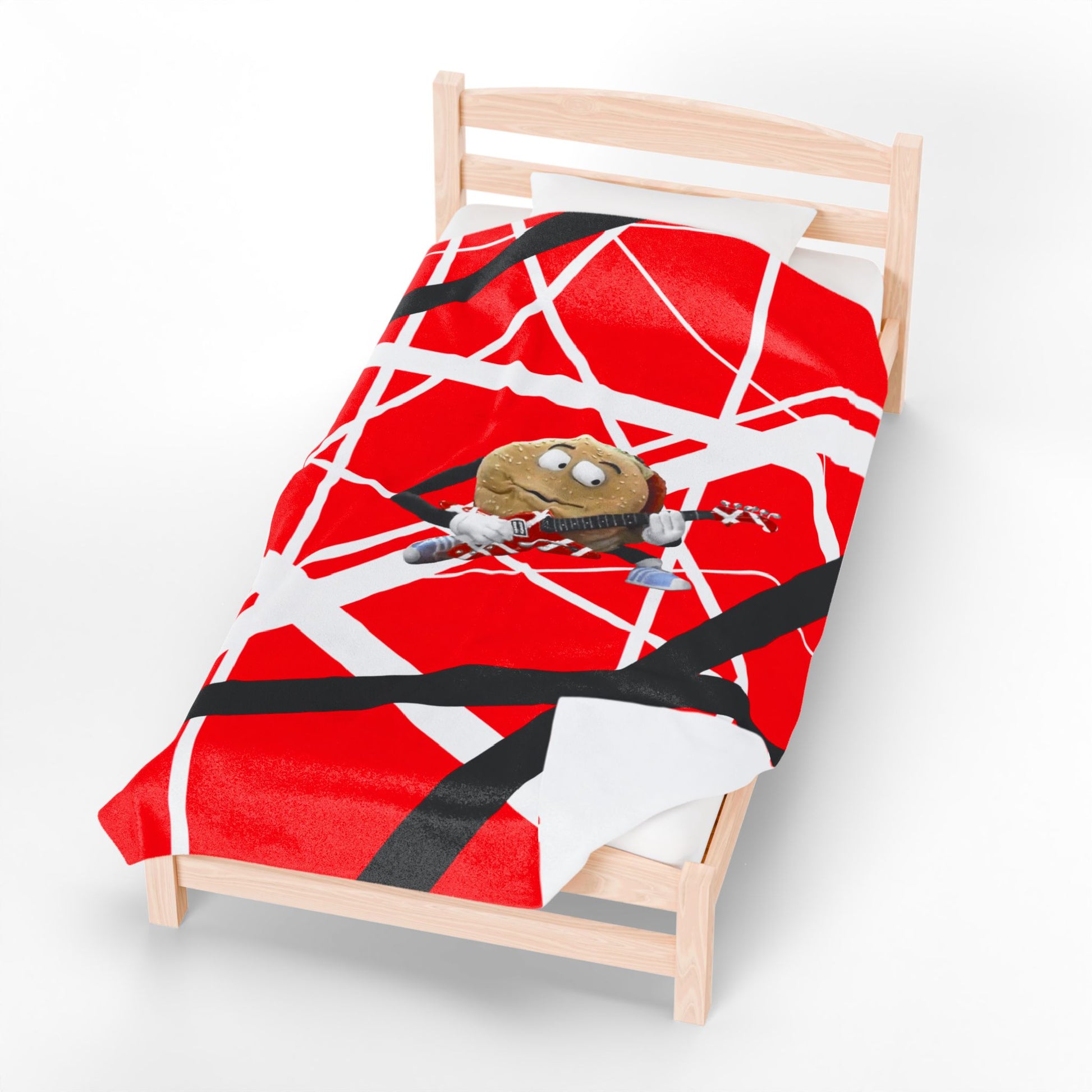 60x80 plush blanket with red, white, black Frankenstein stripes with singing hamburger guitar graphic, inspired by Better Off Dead and Van Halen, shown on bed.