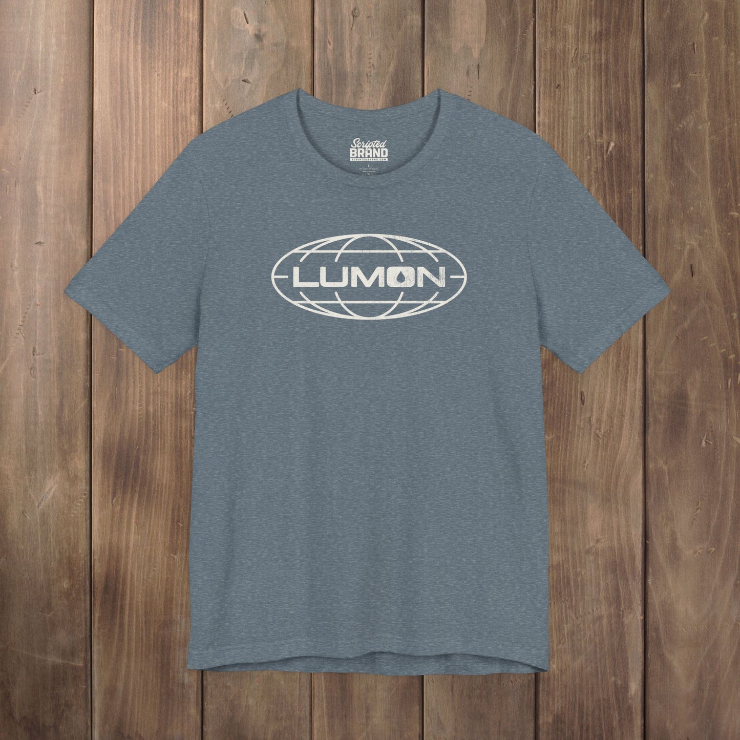 Heather slate blue Bella+Canvas tee with a vintage distressed Lumon Industries globe logo from the Apple TV show Severance