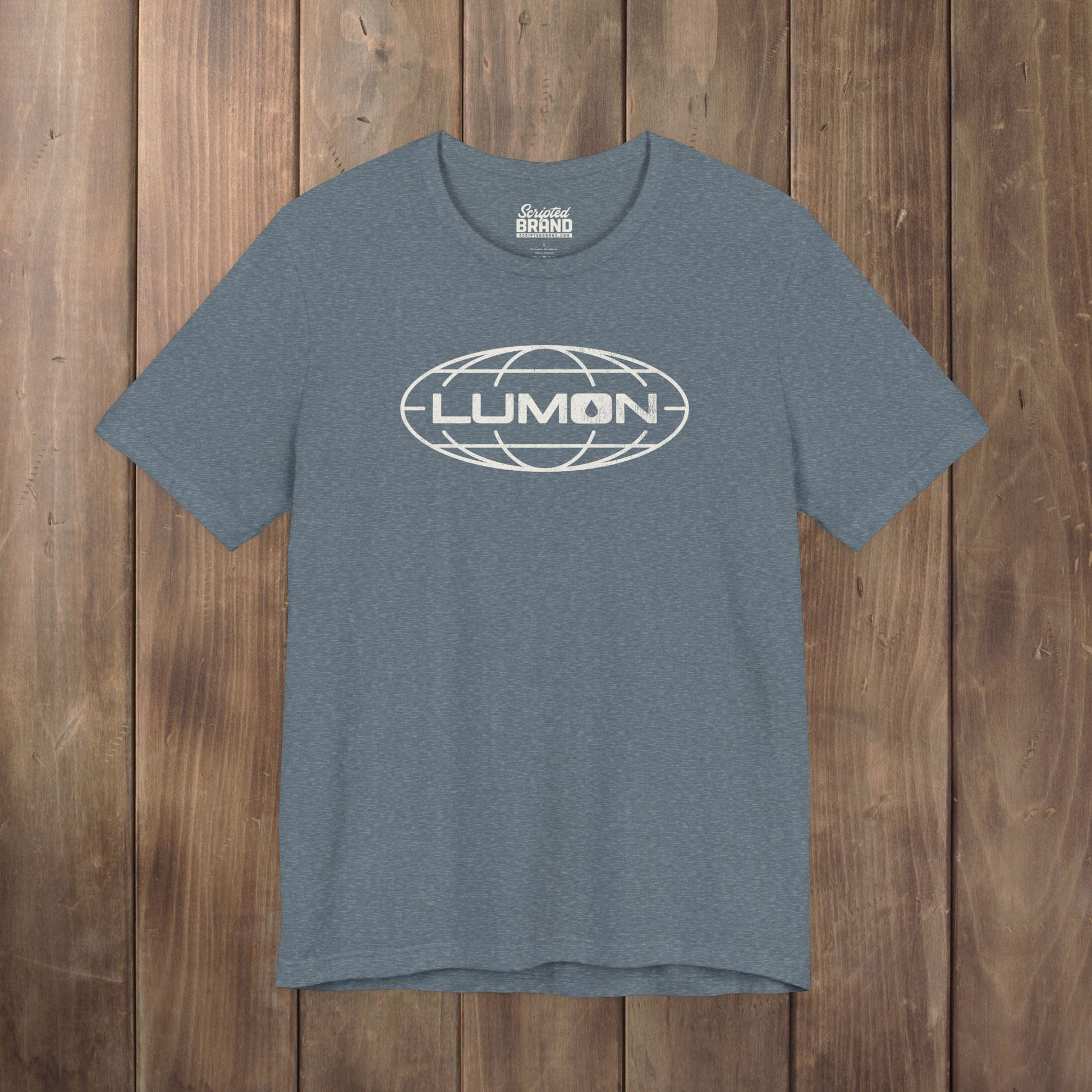 Heather slate blue Bella+Canvas tee with a vintage distressed Lumon Industries globe logo from the Apple TV show Severance