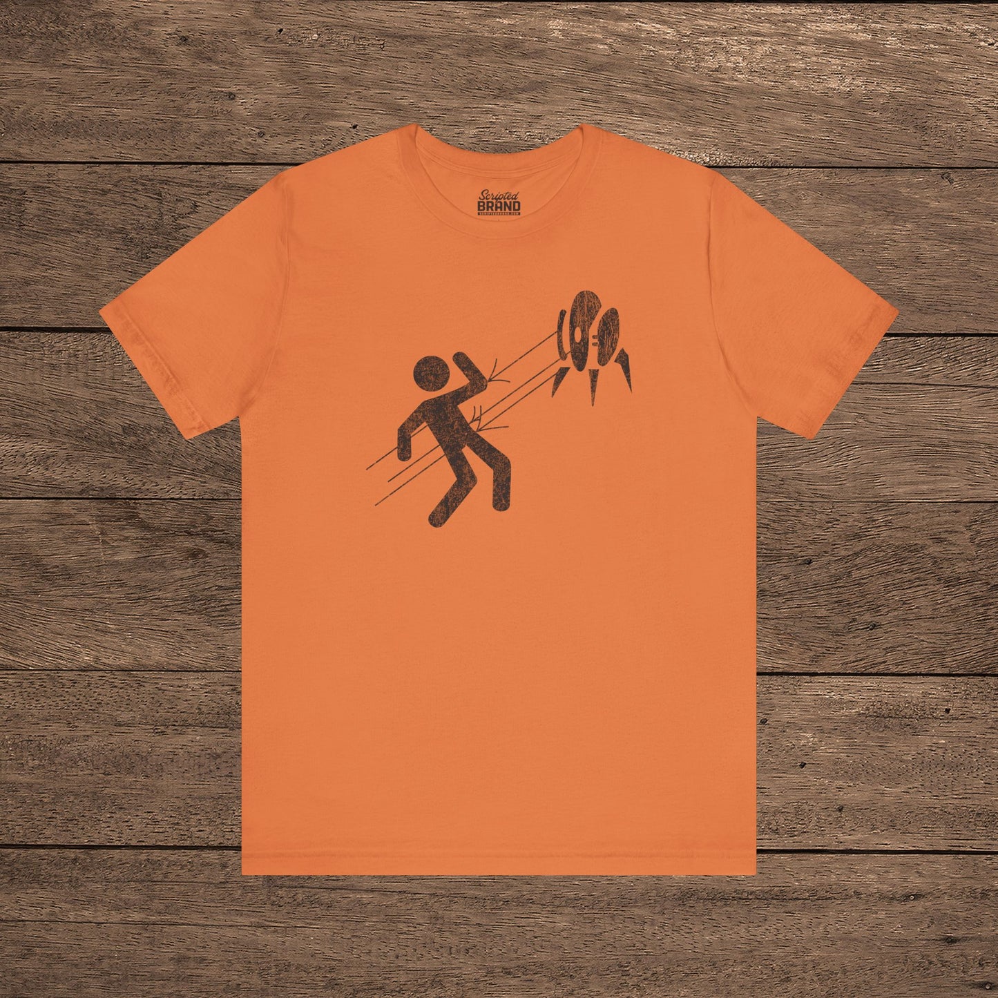 Orange Aperture Science Turret warning icon t-shirt on Bella+Canvas 3001, vintage distressed print, Portal and Portal 2 fan tee.