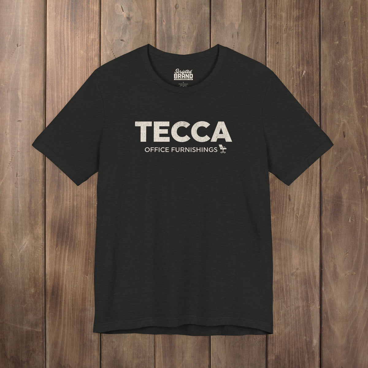 Heather black TECCA Office Furnishings tee inspired by The Chair Company. Bella+Canvas tim robinson shirt comedy.