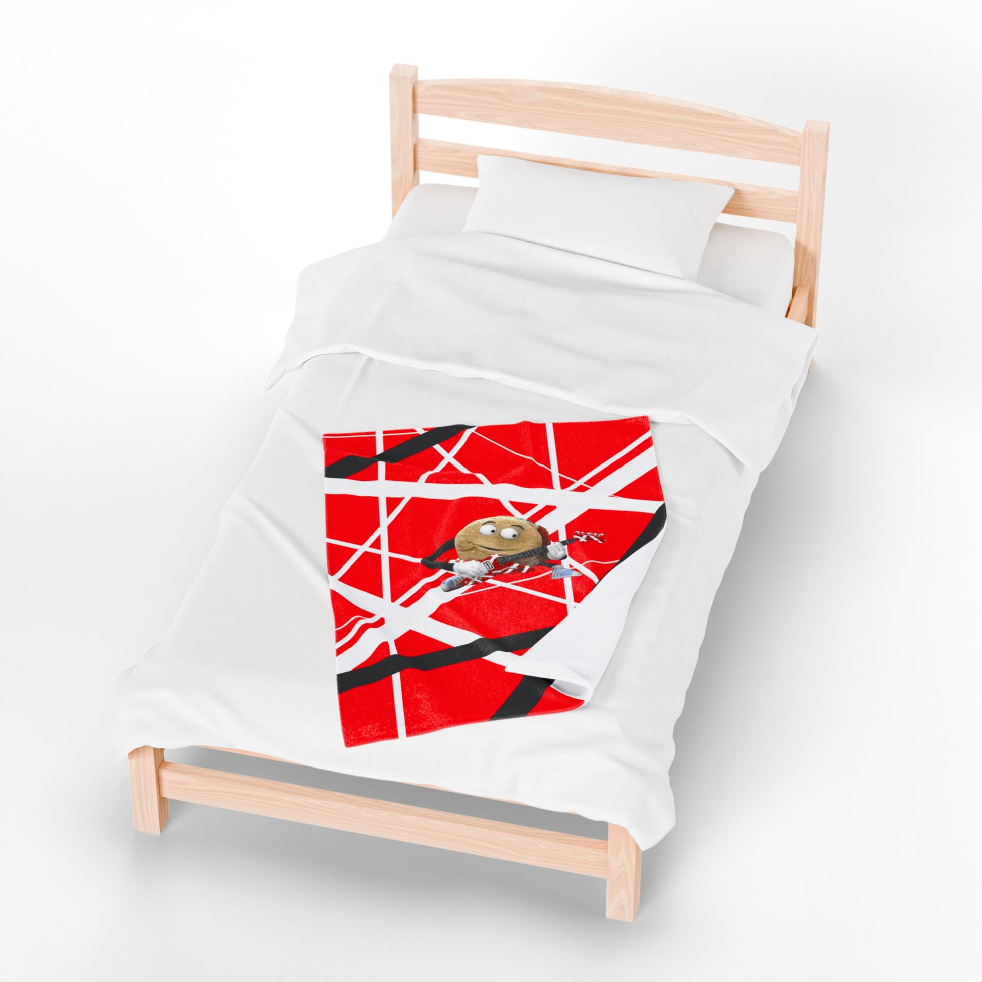30x40 plush blanket with red, white, black Frankenstein stripes with singing hamburger guitar graphic, inspired by Better Off Dead and Van Halen, shown on bed.