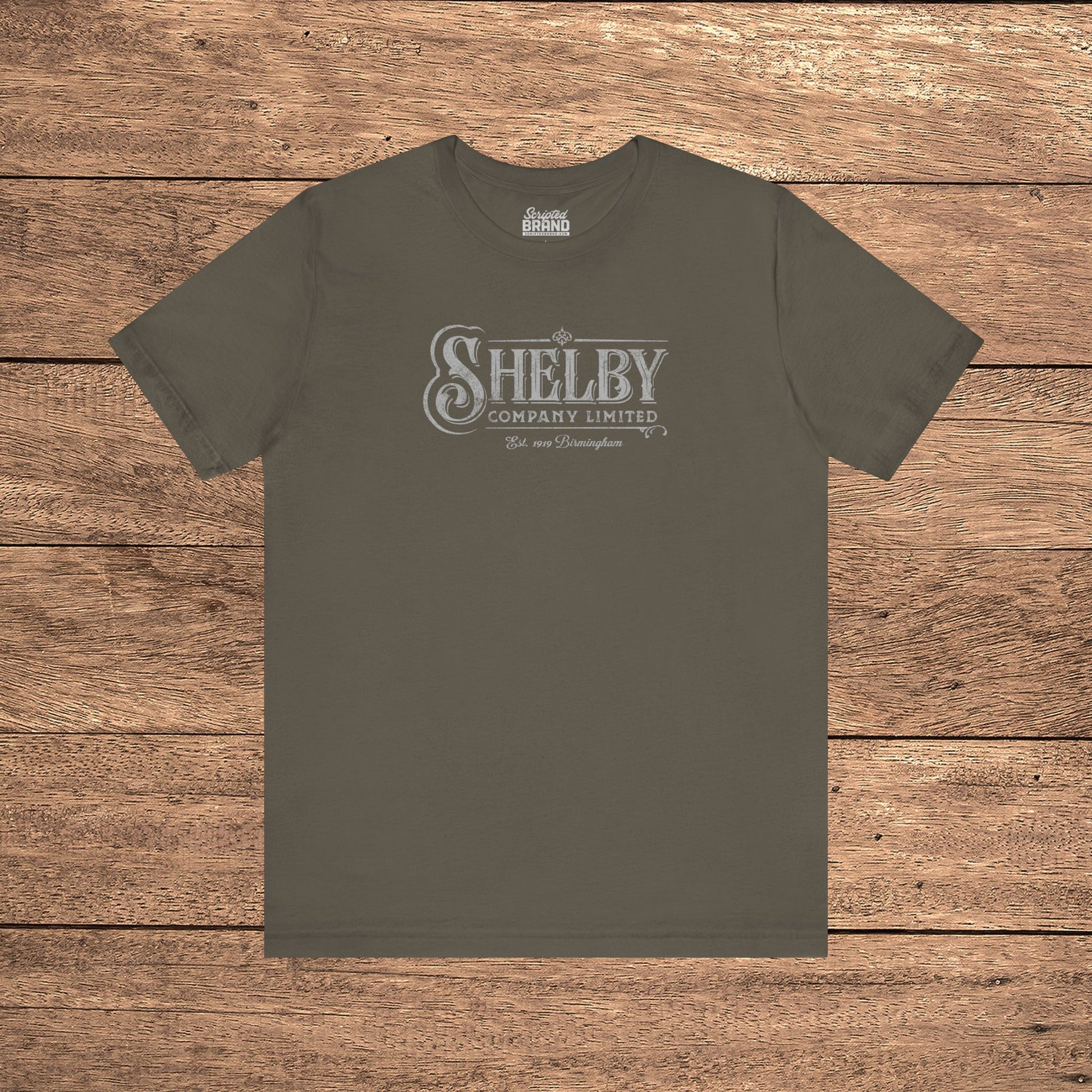 Army green Bella+Canvas 3001 t-shirt featuring a vintage Shelby Company Limited logo from Peaky Blinders.