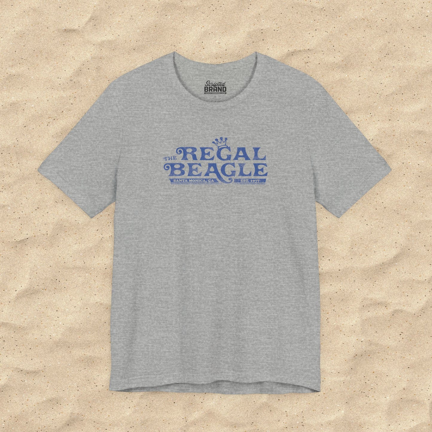 Heather gray Bella+Canvas t-shirt with the Regal Beagle logo from the TV Show 'Threes Company' in a vintage distressed style.