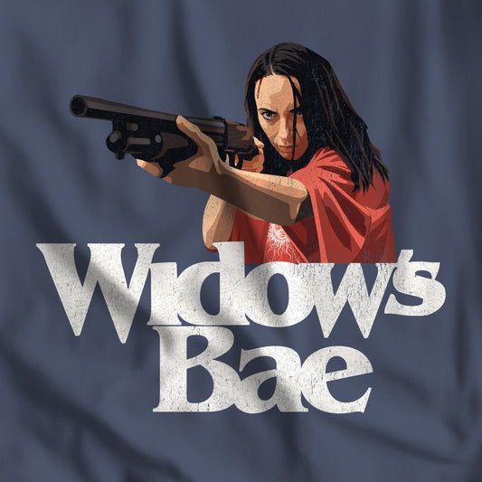 Closeup of Midnight Blue Comfort Colors tee with a vector illustration of Patricia from Widow's Bay and the pun text "Widow's Bae"