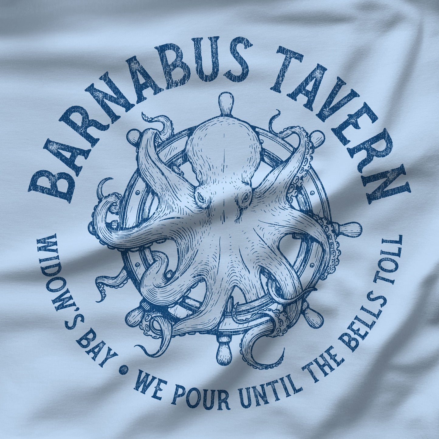 Closeup of blue crewneck sweatshirt with vintage Barnabus Tavern graphic from Widow's Bay TV show octopus design