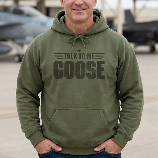 Man wearing military green Talk to Me Goose vintage distressed graphic hoodie inspired by Top Gun, heavy blend cotton sweatshirt
