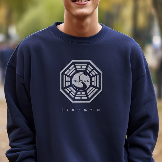 Model wearing a Navy blue Soft Gildan 18000 crew neck sweatshirt featuring the Dharma Initiative swan logo graphic from the TV show LOST in a vintage distressed ink-stamped worn-in style.