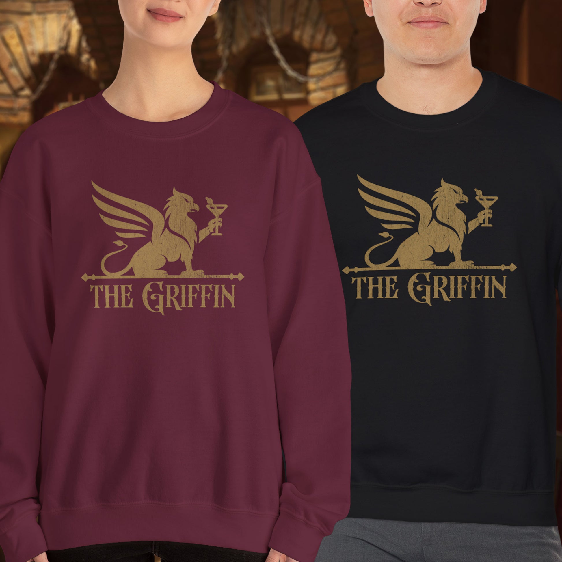Two people wearing crewneck sweatshirts with vintage distressed The Griffin Bar logo graphic inspired by New Girl