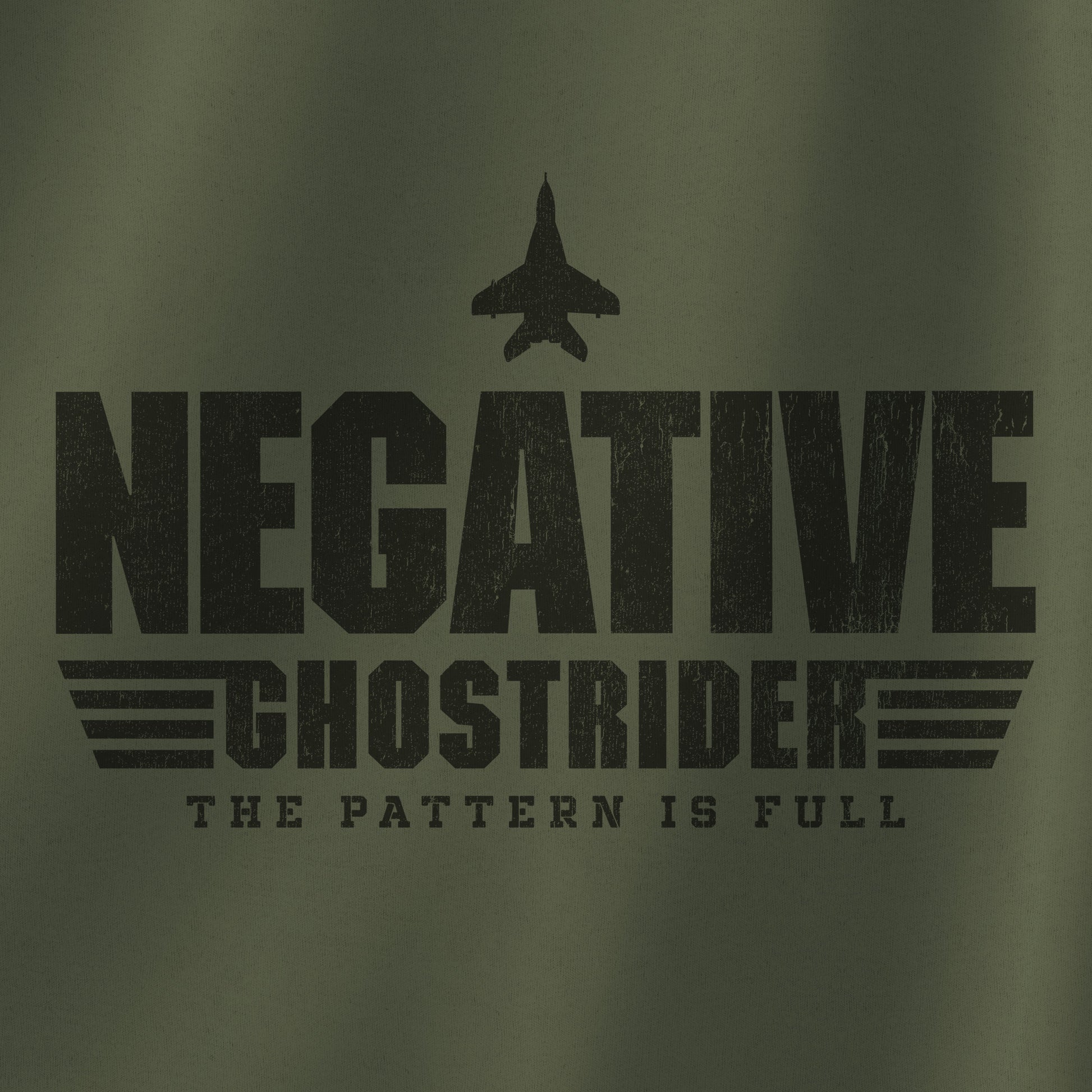 Closeup of Military green sweatshirt with distressed “Negative Ghostrider, The Pattern Is Full” design inspired by Top Gun.