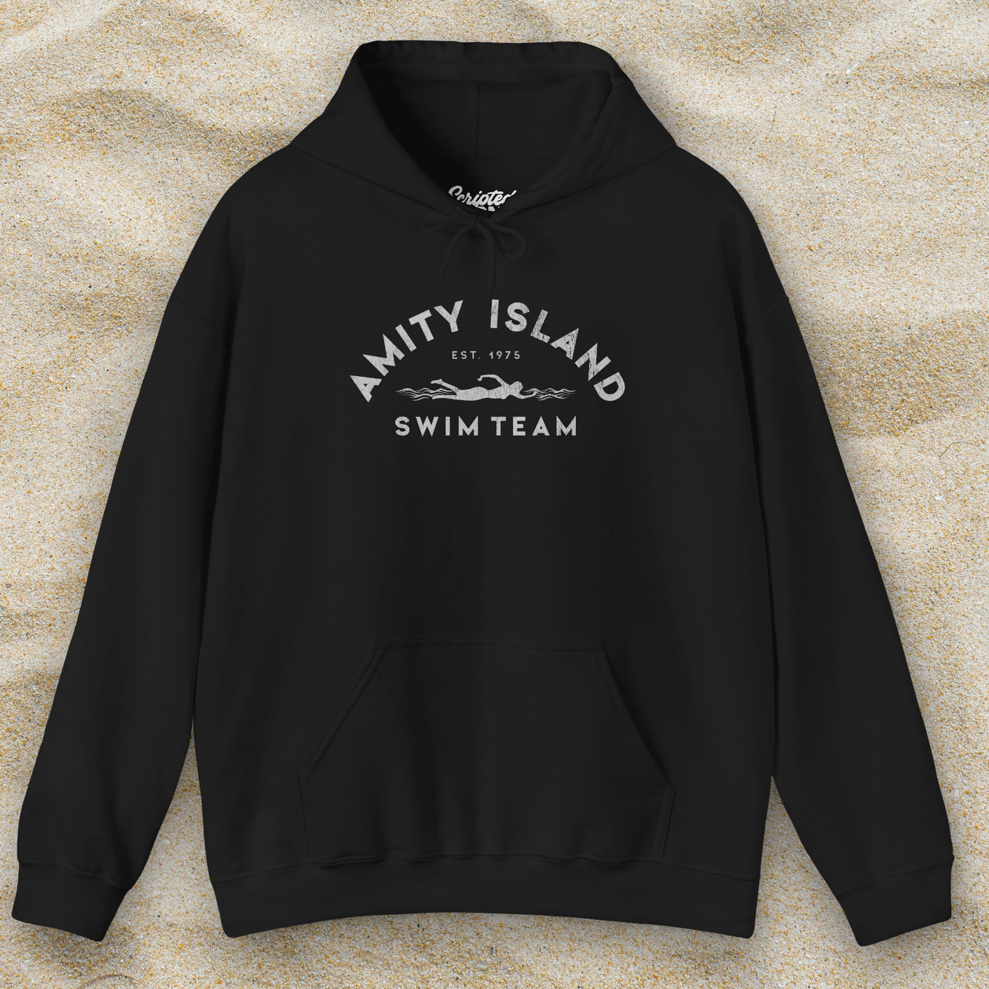 Front view of a black colored Soft Unisex Hoodie Heavy Blend Hooded Sweatshirt featuring an Amity Island Swim Team logo graphic, designed by ScriptedBrand, and  inspired by the movie Jaws in a vintage distressed style.