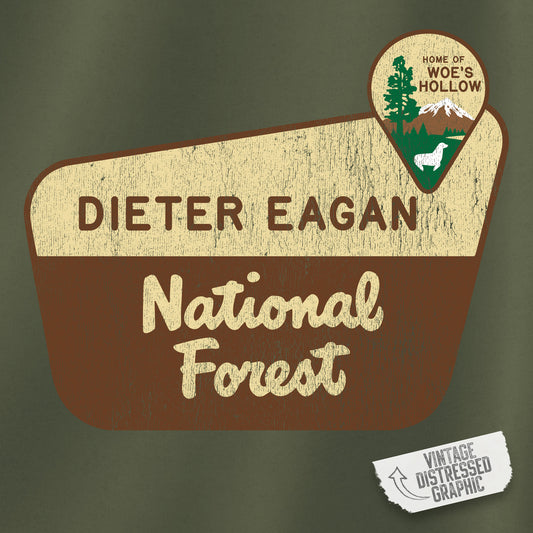 Closeup view of a logo graphic of the Dieter Eagan National Forest sign designed by ScriptedBrand, inspired by the TV show Severance in a vintage distressed ink-stamped worn-in style.