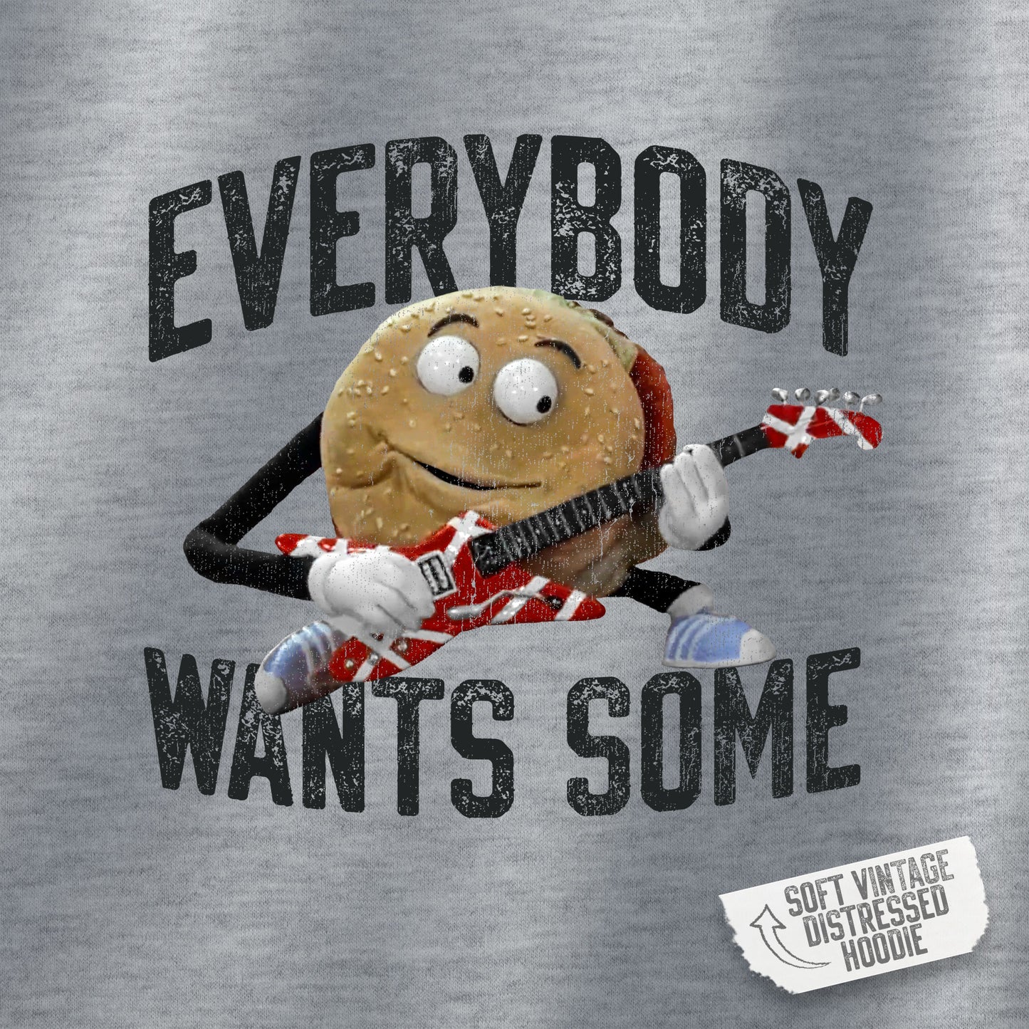 Closeup view of Heather Gray Soft Hoodie Sweatshirt featuring Better Off Dead movie vintage Van Halen guitar Everybody Wants Some graphic with pig burger.